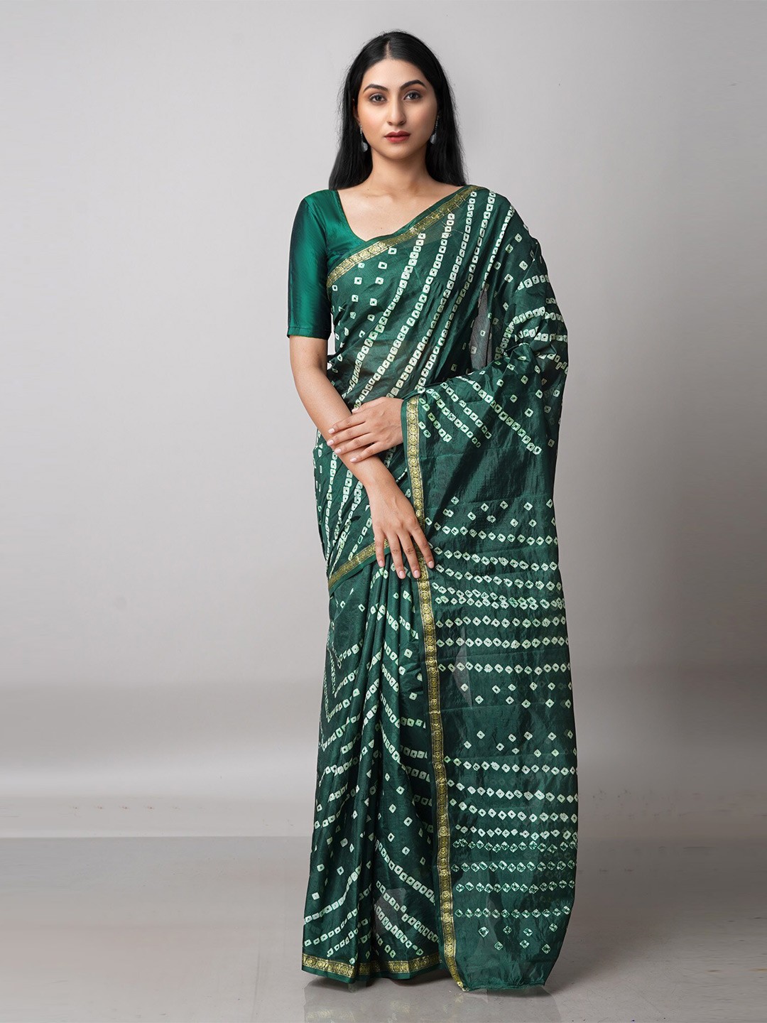 

Unnati Silks Green & White Bandhani Printed Zari Saree