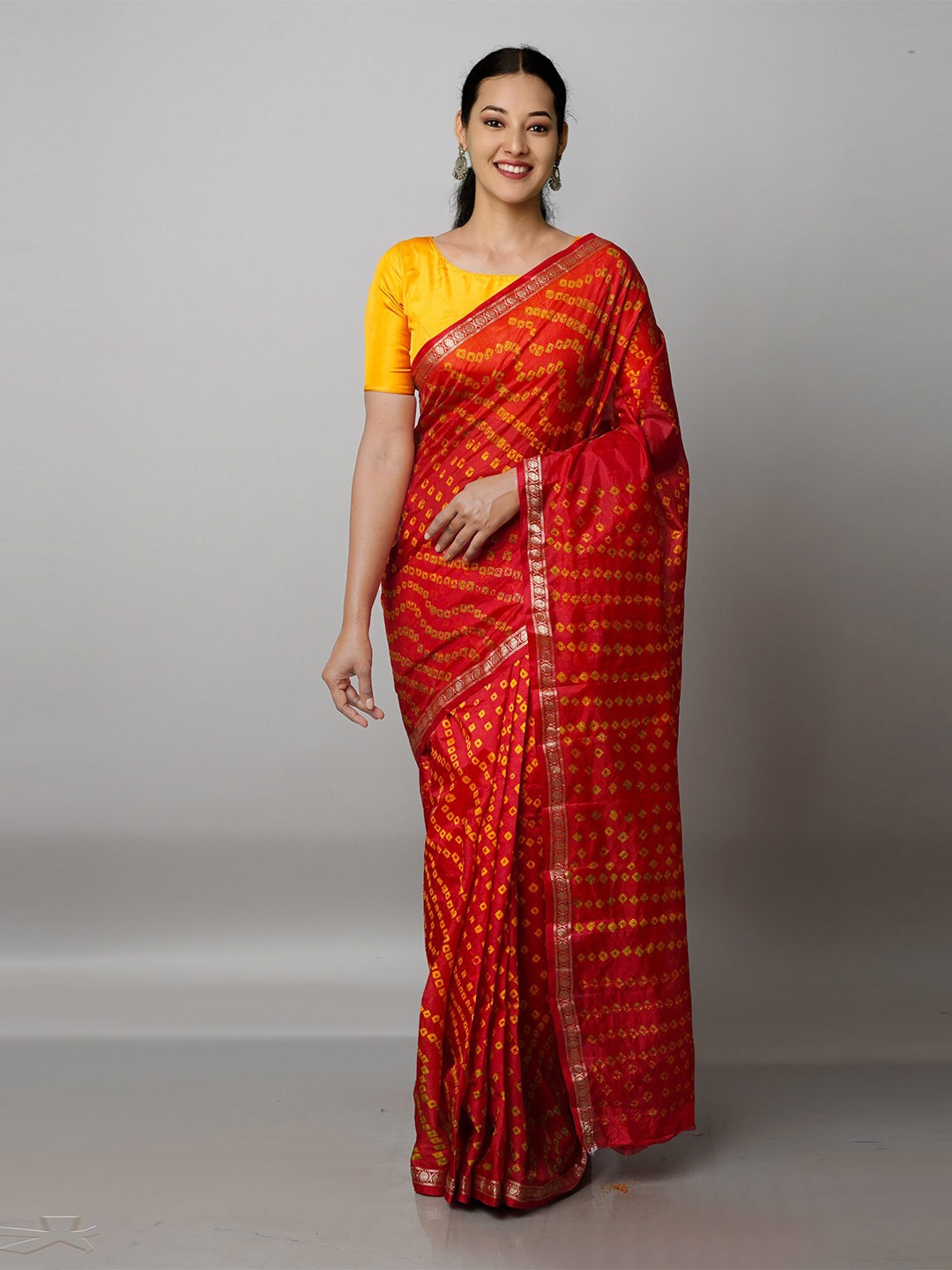 

Unnati Silks Burgundy & Yellow Bandhani Printed Saree
