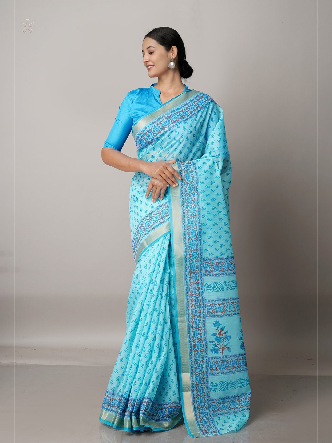 

Unnati Silks Blue & Brown Floral Block Printed Mangalagiri Zari Saree