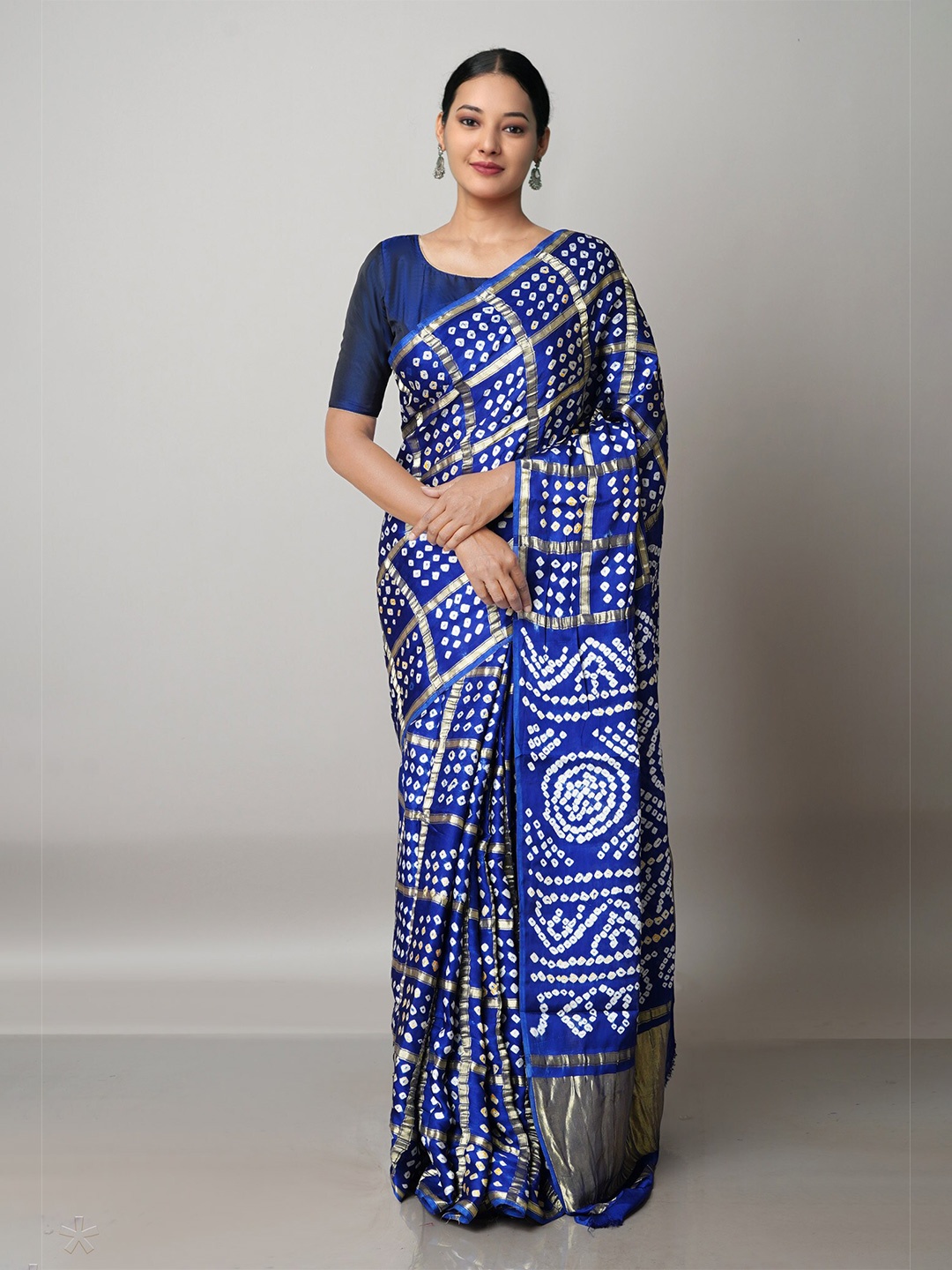 

Unnati Silks Brown & White Bandhani Zari Silk Blend Bandhani Saree