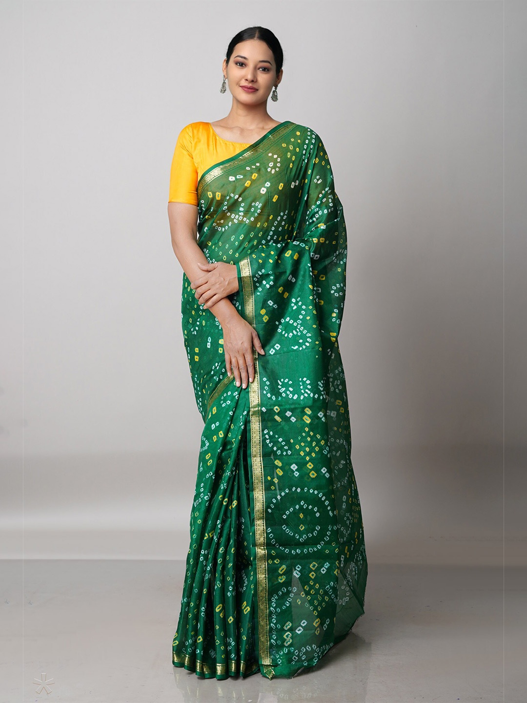 

Unnati Silks Green & White Bandhani Zari Silk Blend Bandhani Saree