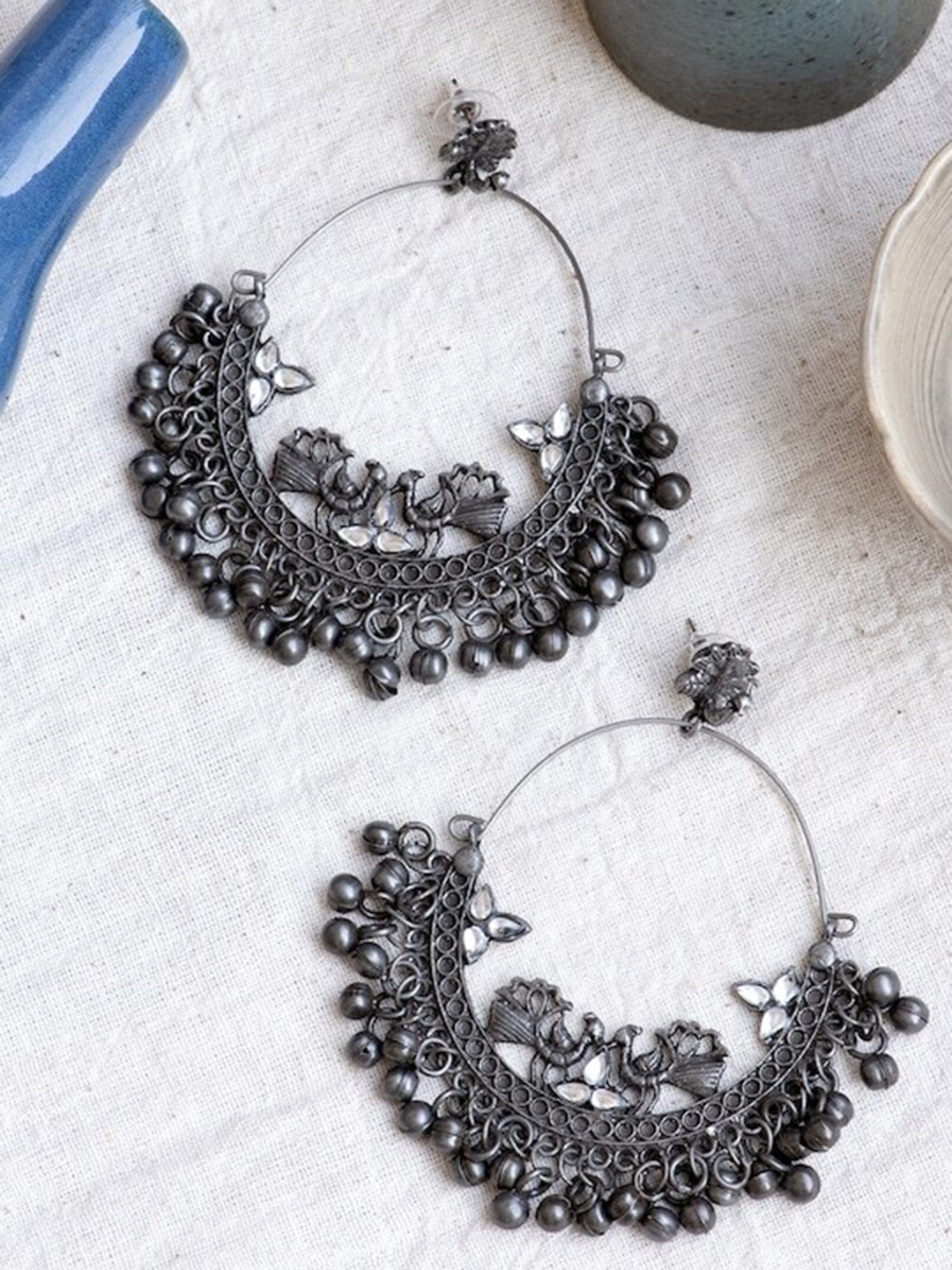 

Infuzze Silver-Toned Crescent Shaped Chandbalis Earrings