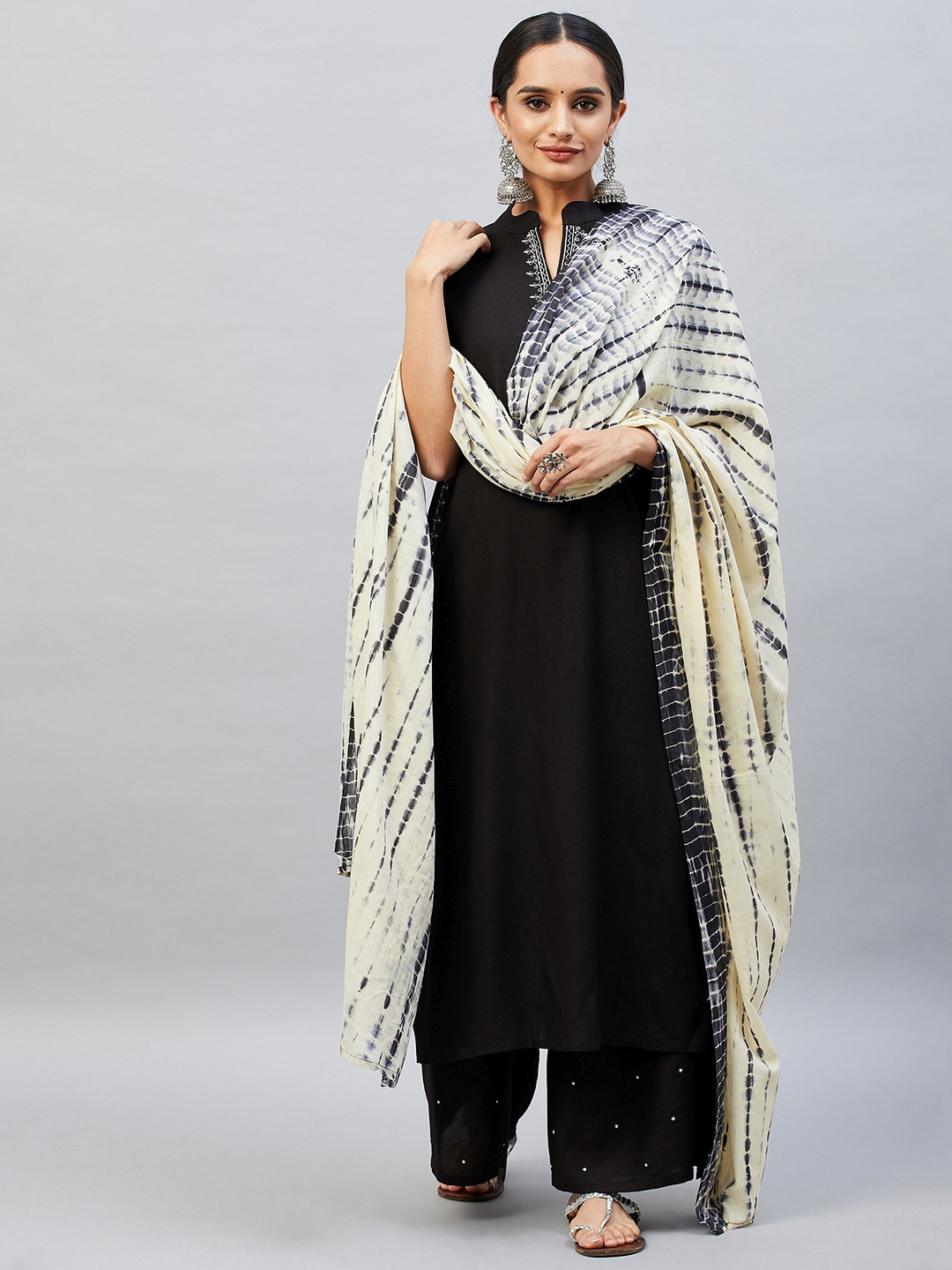 

Aaheli Women Black Thread Work Kurta with Palazzos & With Dupatta