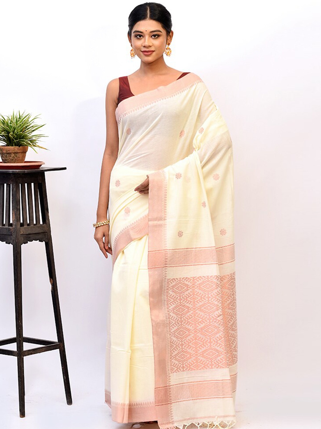 

AllSilks Cream-Coloured & Orange Floral Zari Silk Blend Saree