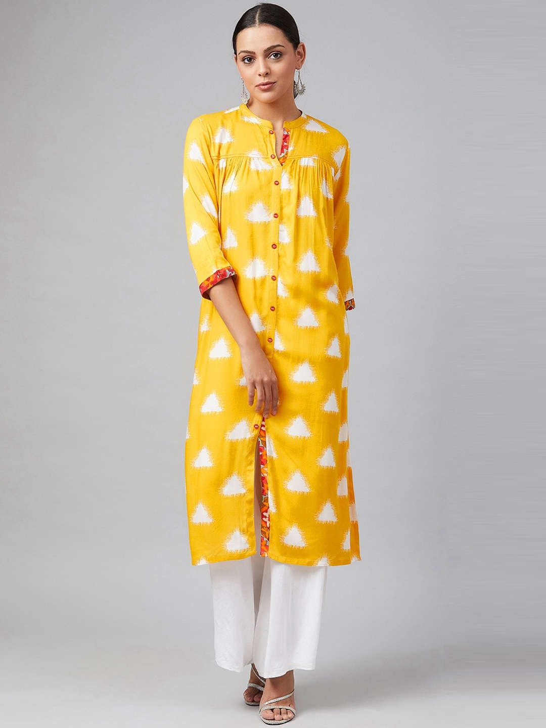 

Tulsattva Geometric Printed Mandarin Collar A-Line Regular Kurta, Yellow