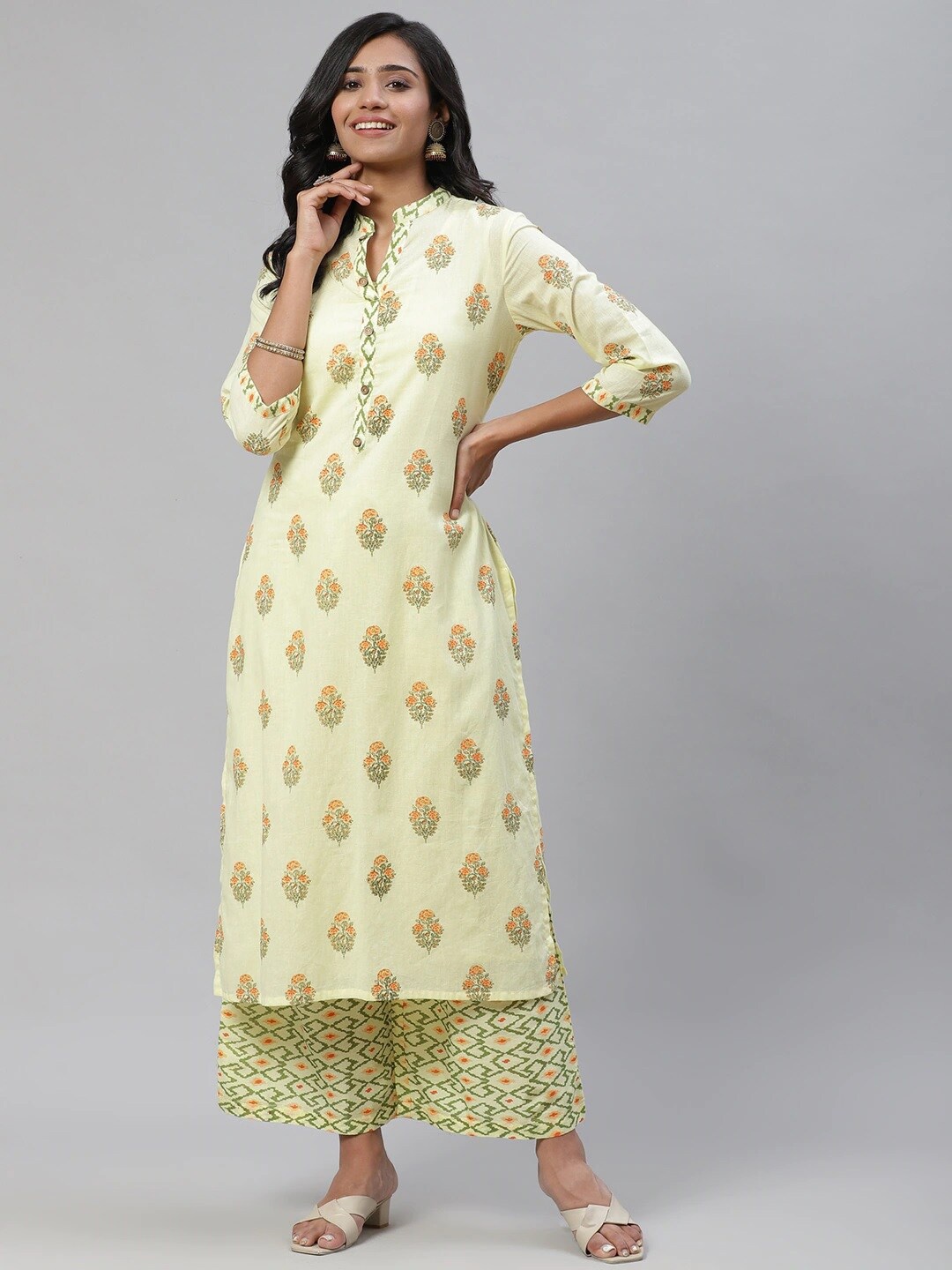 

Tulsattva Women Yellow Ethnic Motifs Printed Pure Cotton Kurta with Trouser