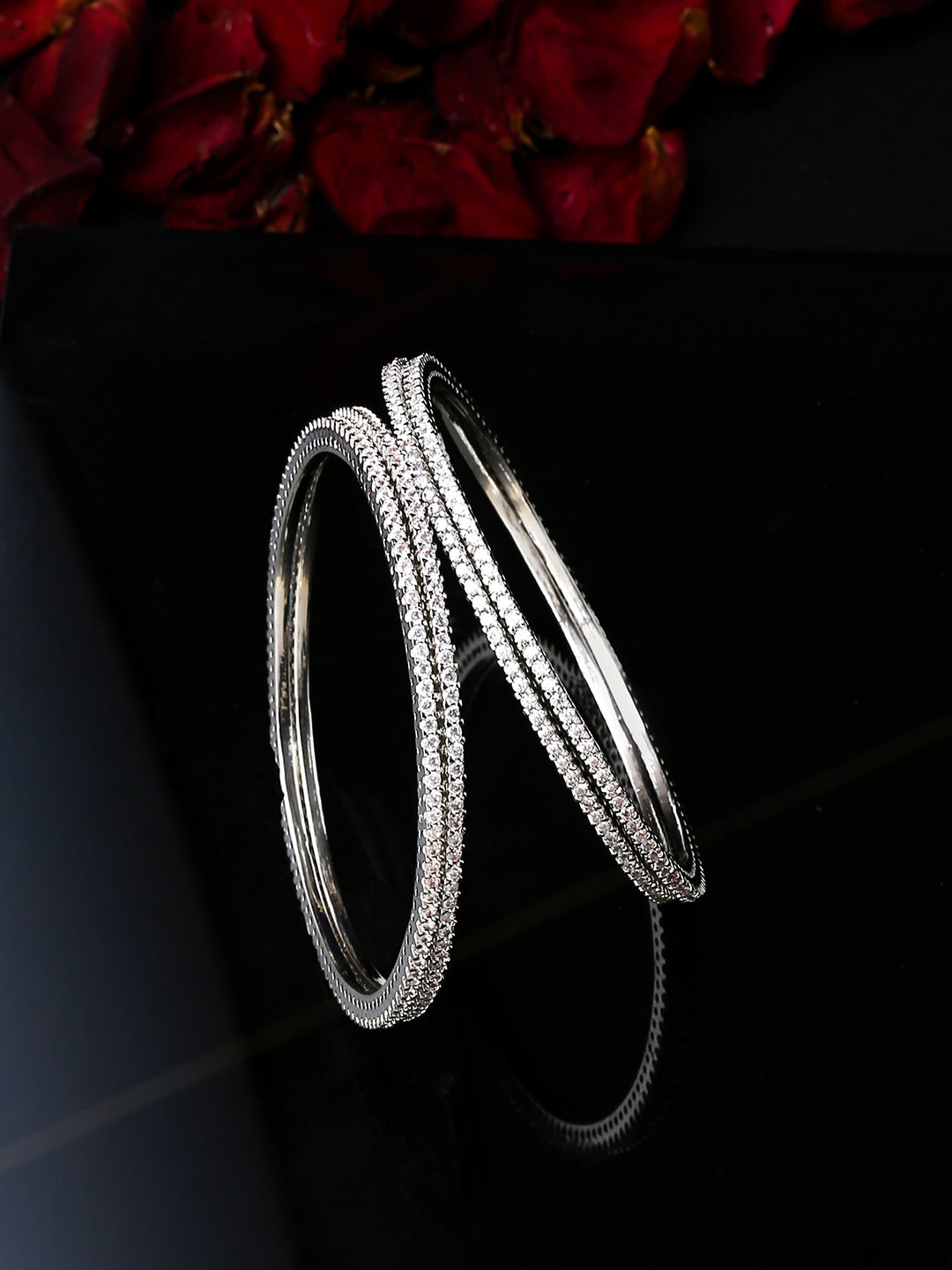 

Yellow Chimes Set of 4 White Silver-Plated American Diamond Studded Bangles