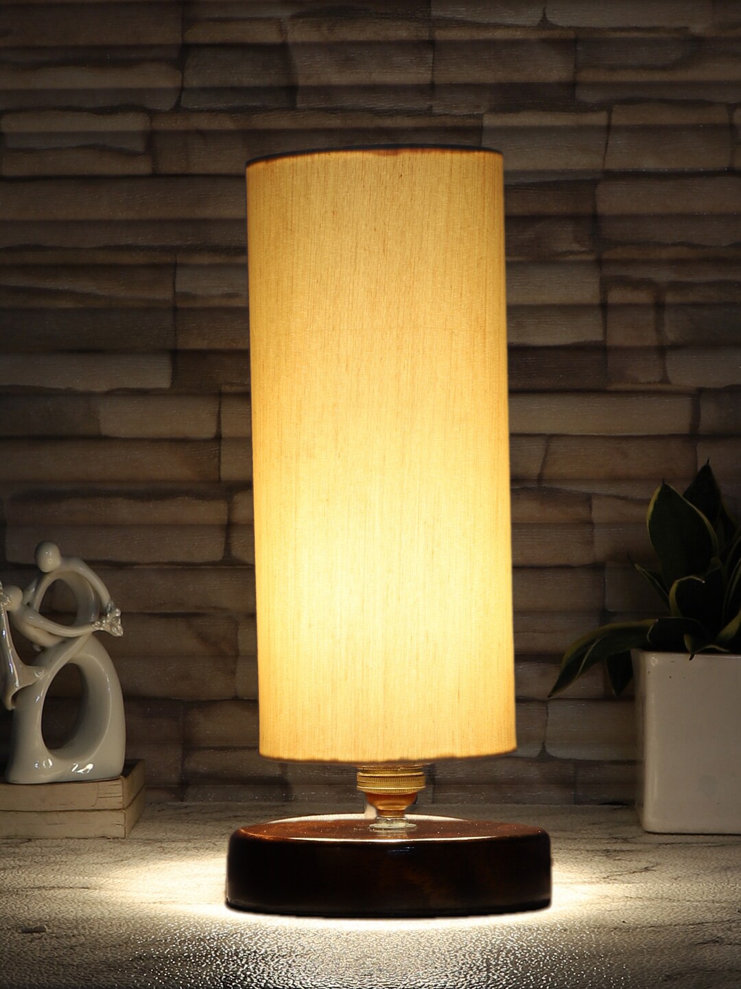 

Devansh Off White Solid Cotton Table Lamp with Brown Base