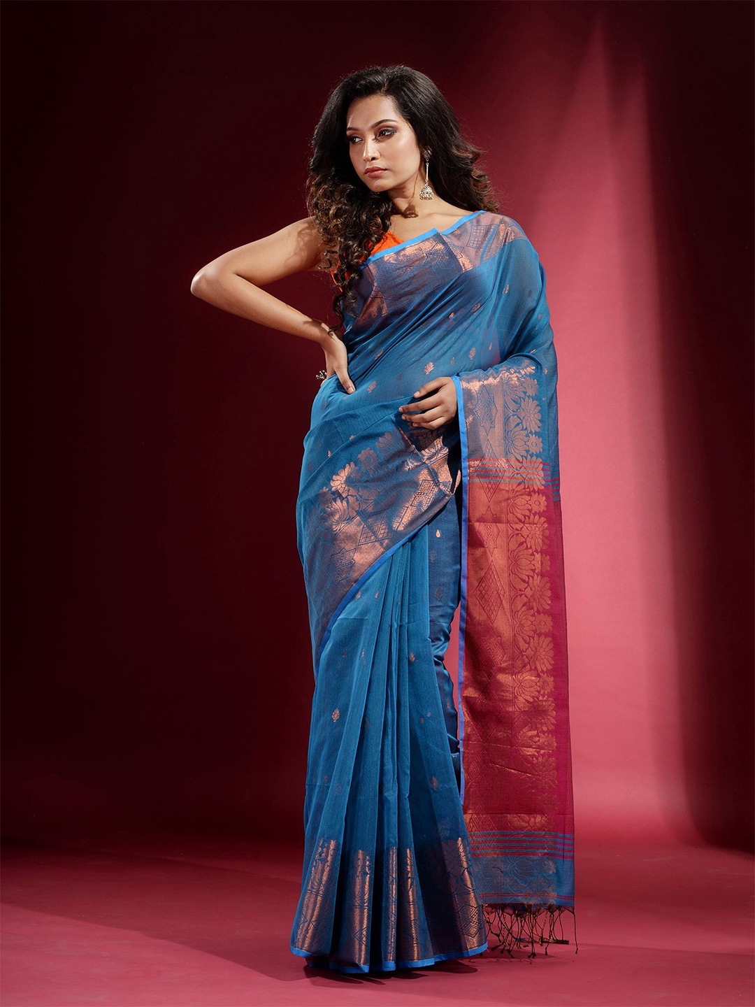 

Charukriti Blue & Copper-Toned Woven Design Zari Saree