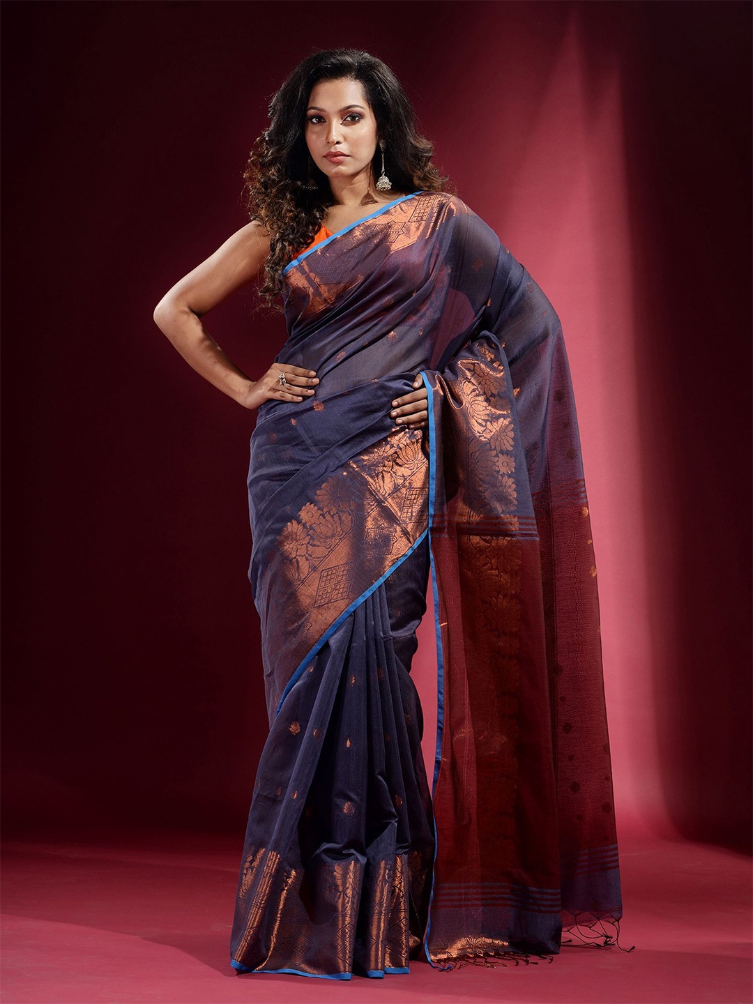 

Charukriti Blue & Copper-Toned Woven Design Zari Saree