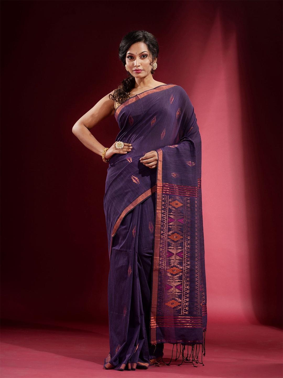 

Charukriti Purple & Copper-Toned Woven Design Zari Pure Cotton Saree