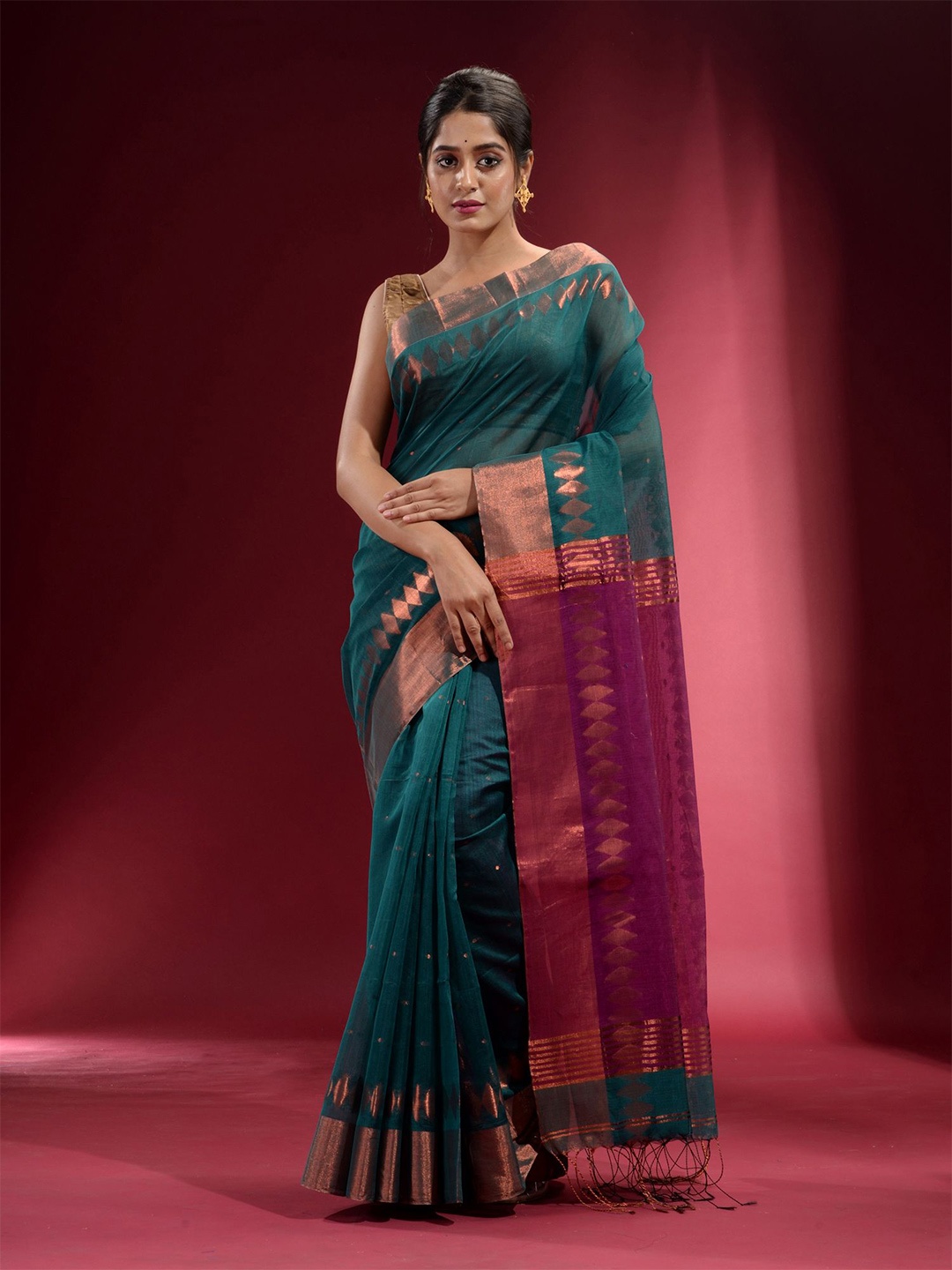 

Charukriti Teal Green & Copper-Toned Woven Design Zari Saree