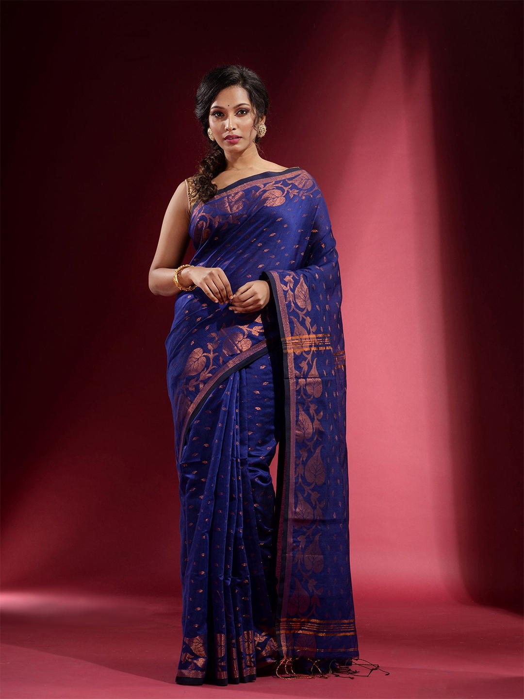 

Charukriti Blue & Copper-Toned Woven Design Zari Saree