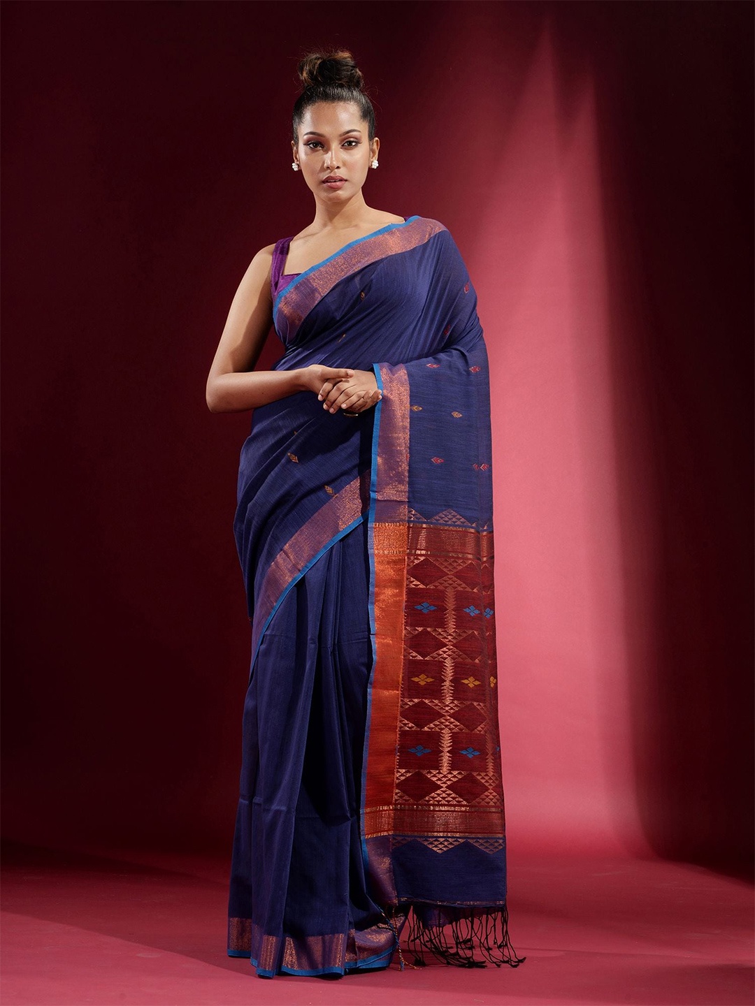 

Charukriti Blue & Copper-Toned Woven Design Zari Pure Cotton Saree