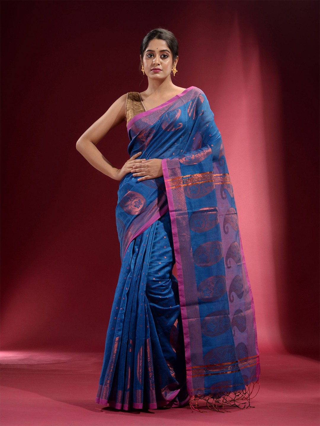 

Charukriti Blue & Copper-Toned Woven Design Zari Saree