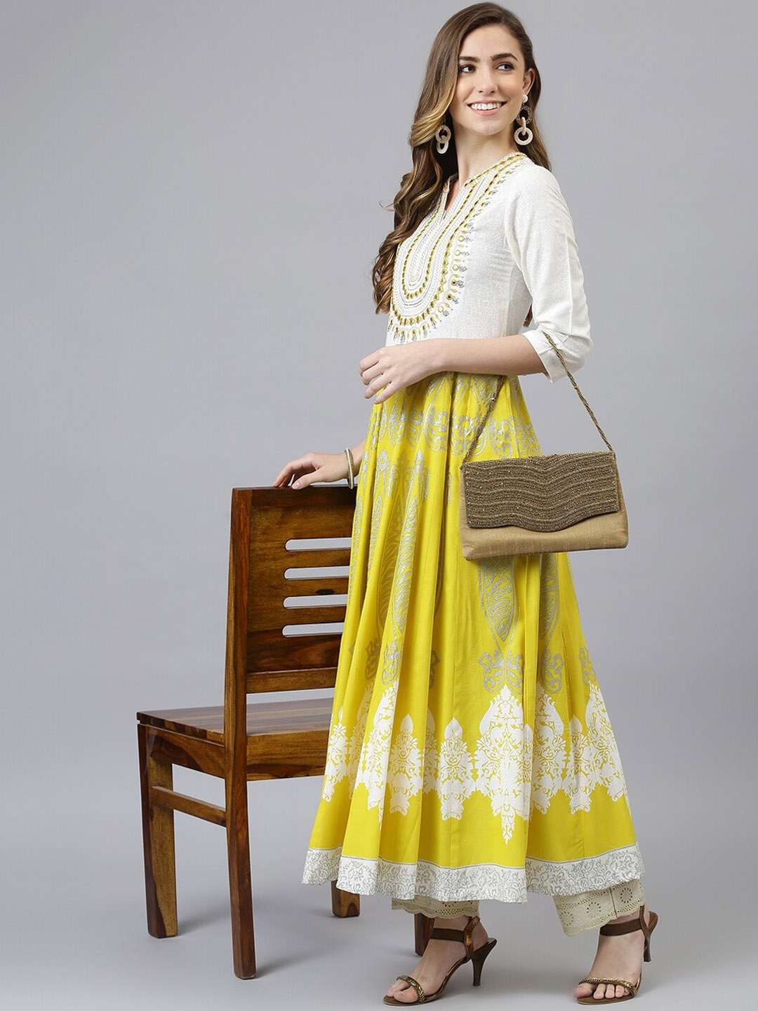 

Khushal K Ethnic Motifs Printed Mirror Work Anarkali Kurta, Yellow