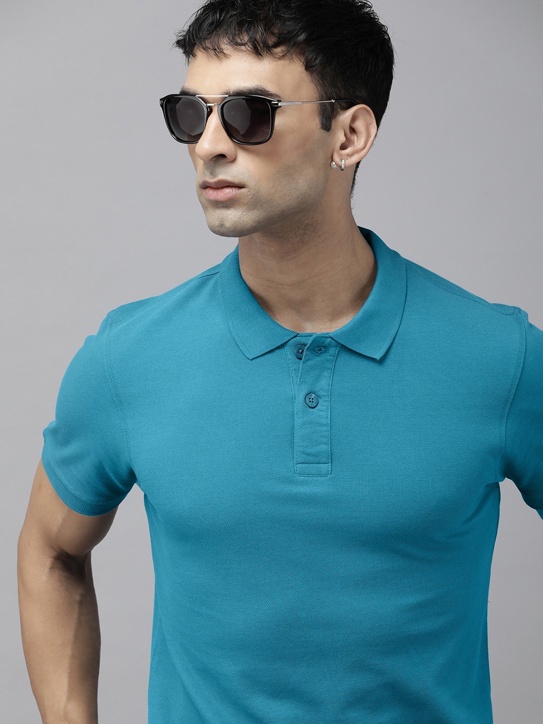 

The Roadster Life Co. Men Pure Cotton Solid Polo Collar T-shirt, Teal