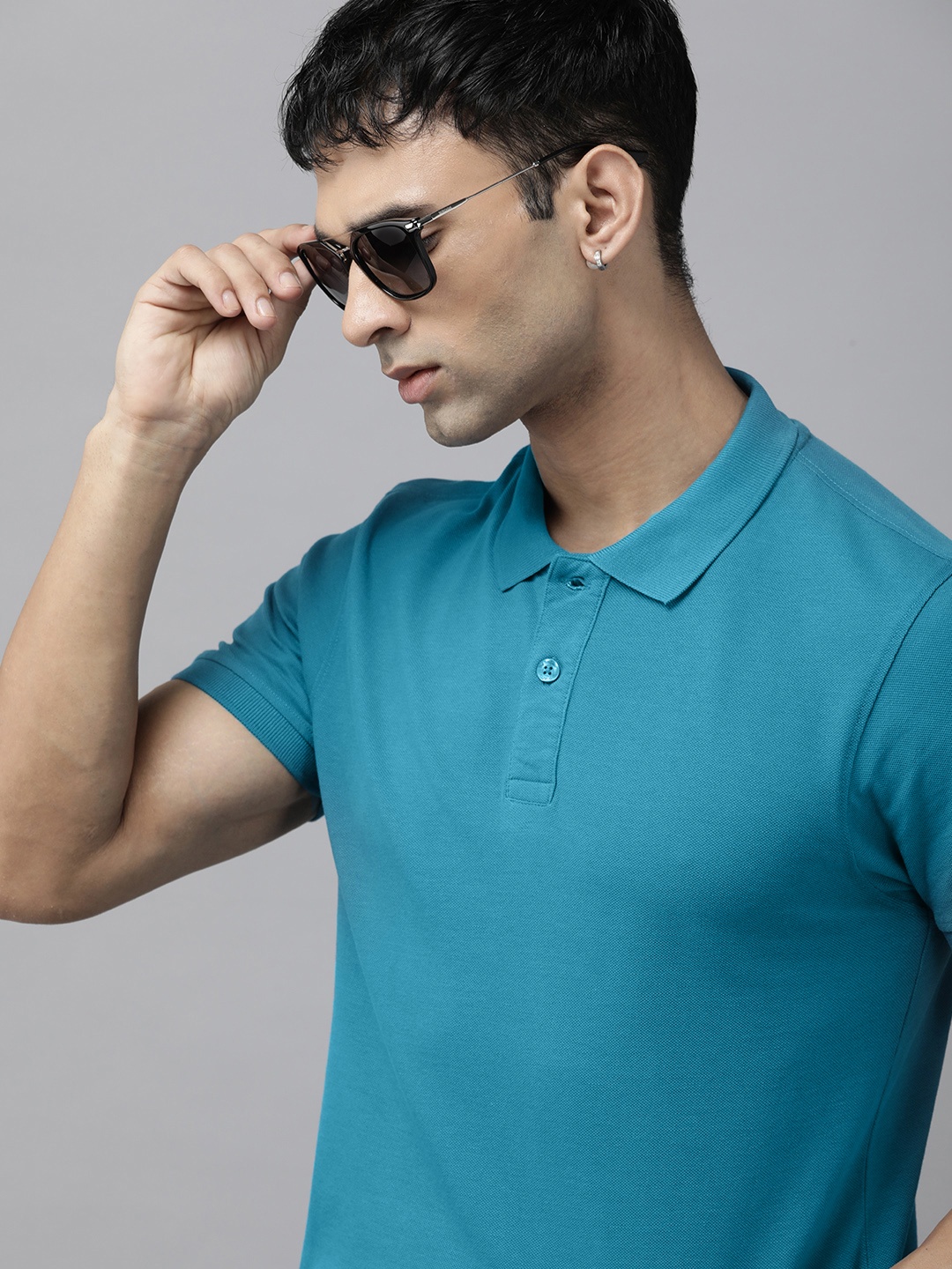 

The Roadster Life Co. Men Pure Cotton Solid Polo Collar T-shirt, Teal