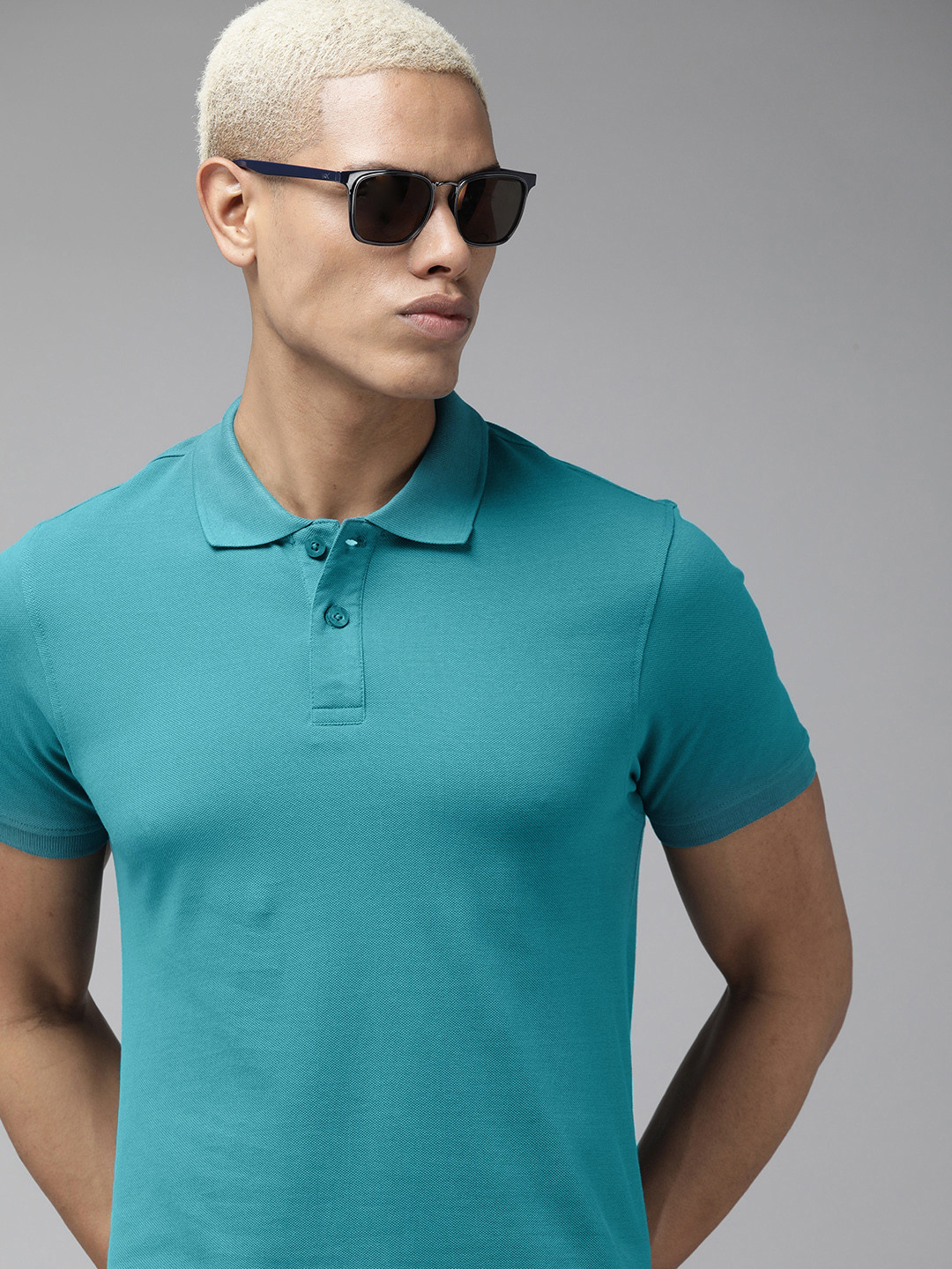 

The Roadster Life Co. Men Pure Cotton Solid Polo Collar T-shirt, Teal