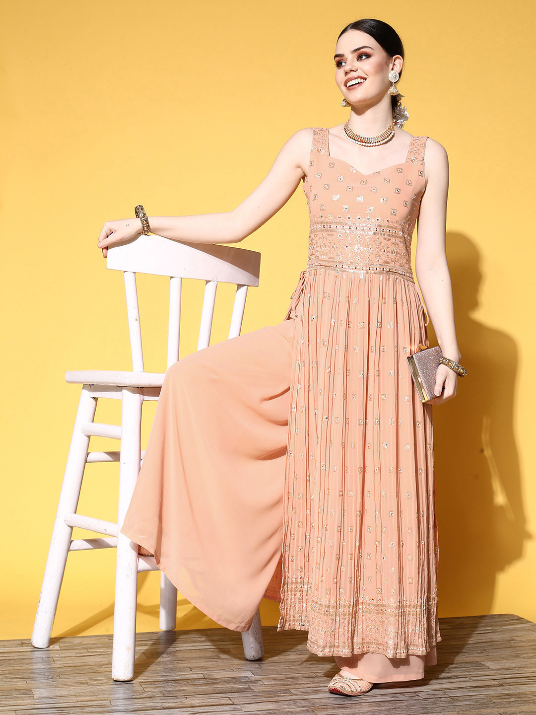 

Kvsfab Women Peach-Coloured Ethnic Motifs Embroidered Kurta with Palazzos