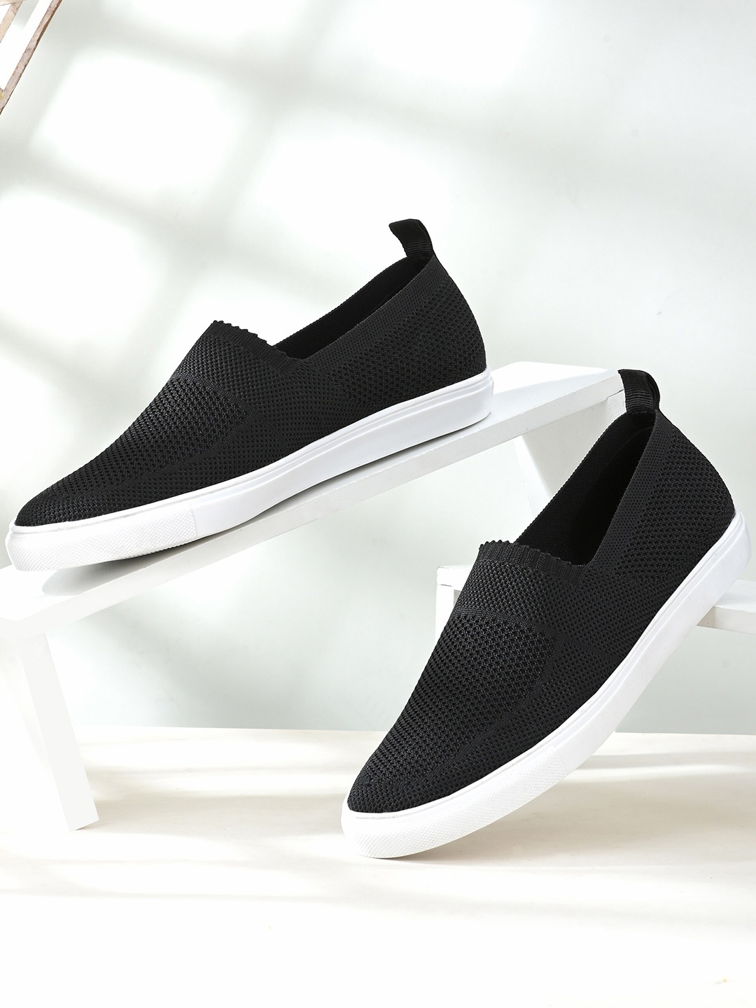 

Roadster Men Black Slip-On Sneakers