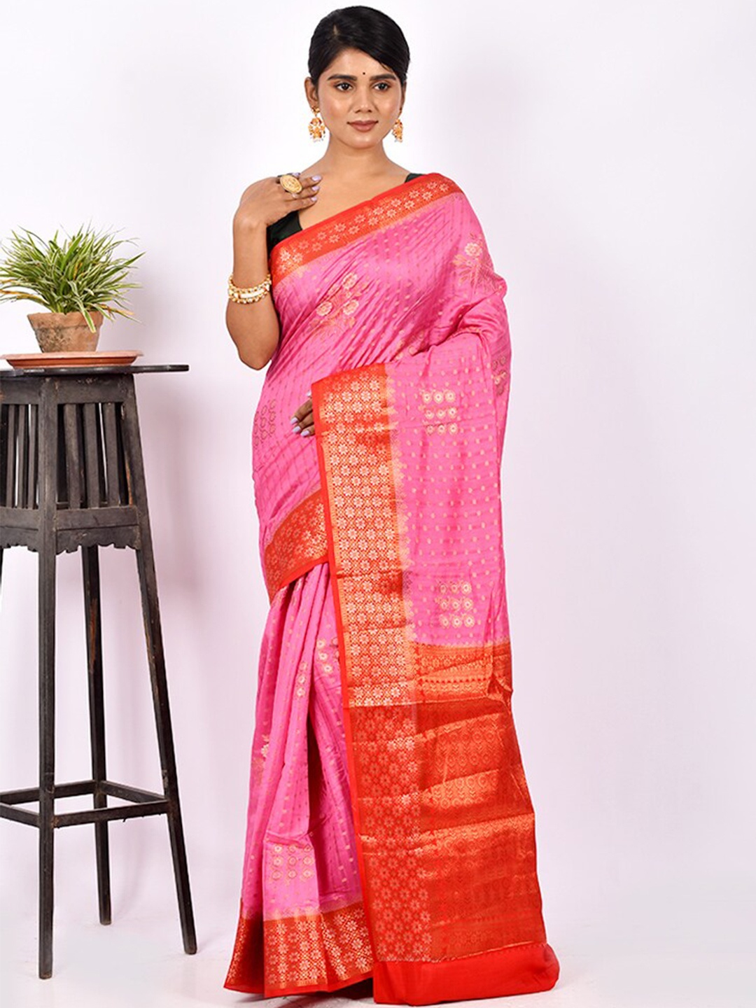 

AllSilks Pink & Orange Floral Silk Blend Tussar Saree