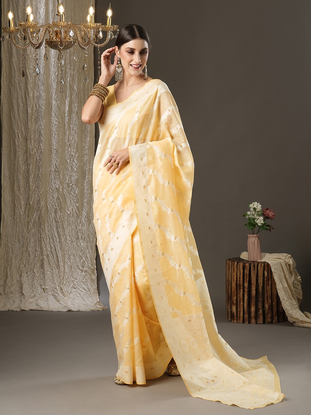 

Mitera Yellow & Gold-Toned Ethnic Motifs Zari Silk Cotton Banarasi Saree