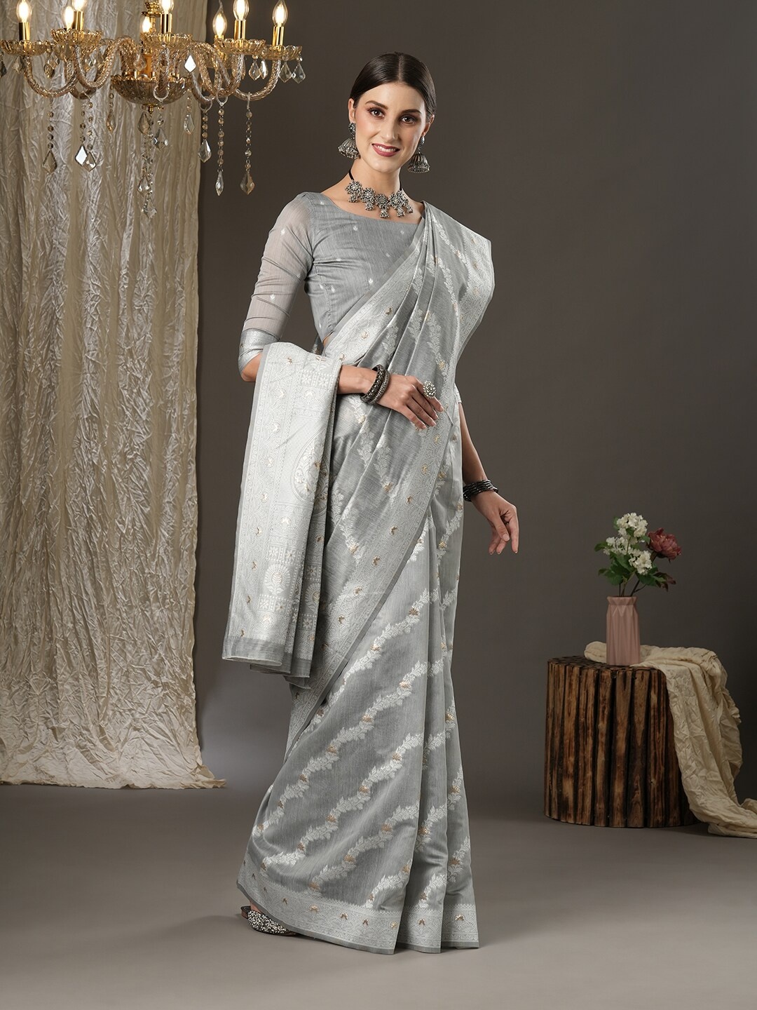 

Mitera Grey & Silver-Toned Ethnic Motifs Zari Silk Cotton Banarasi Saree