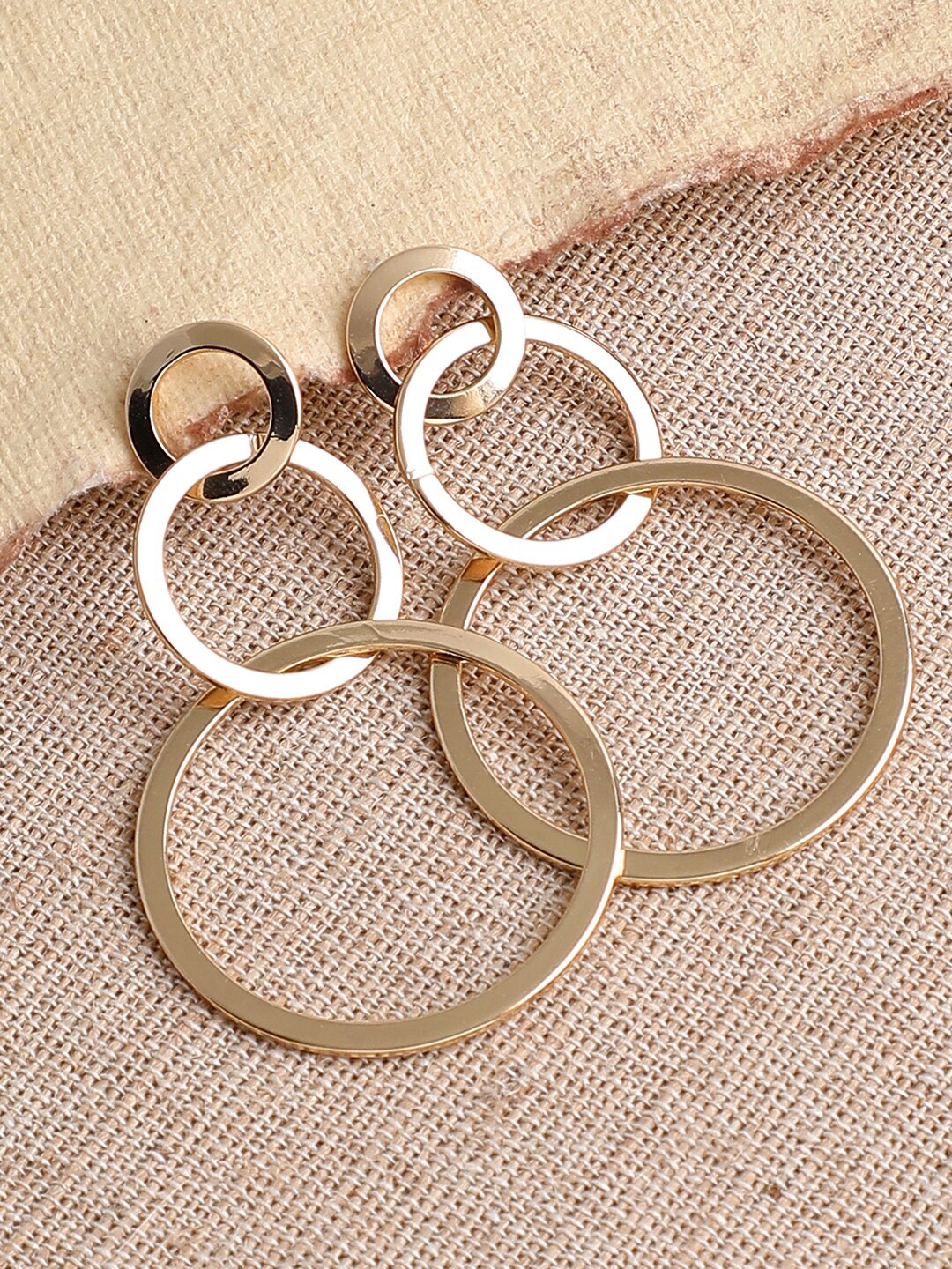 

SOHI Gold-Toned Contemporary Gold Plated Drop Earrings