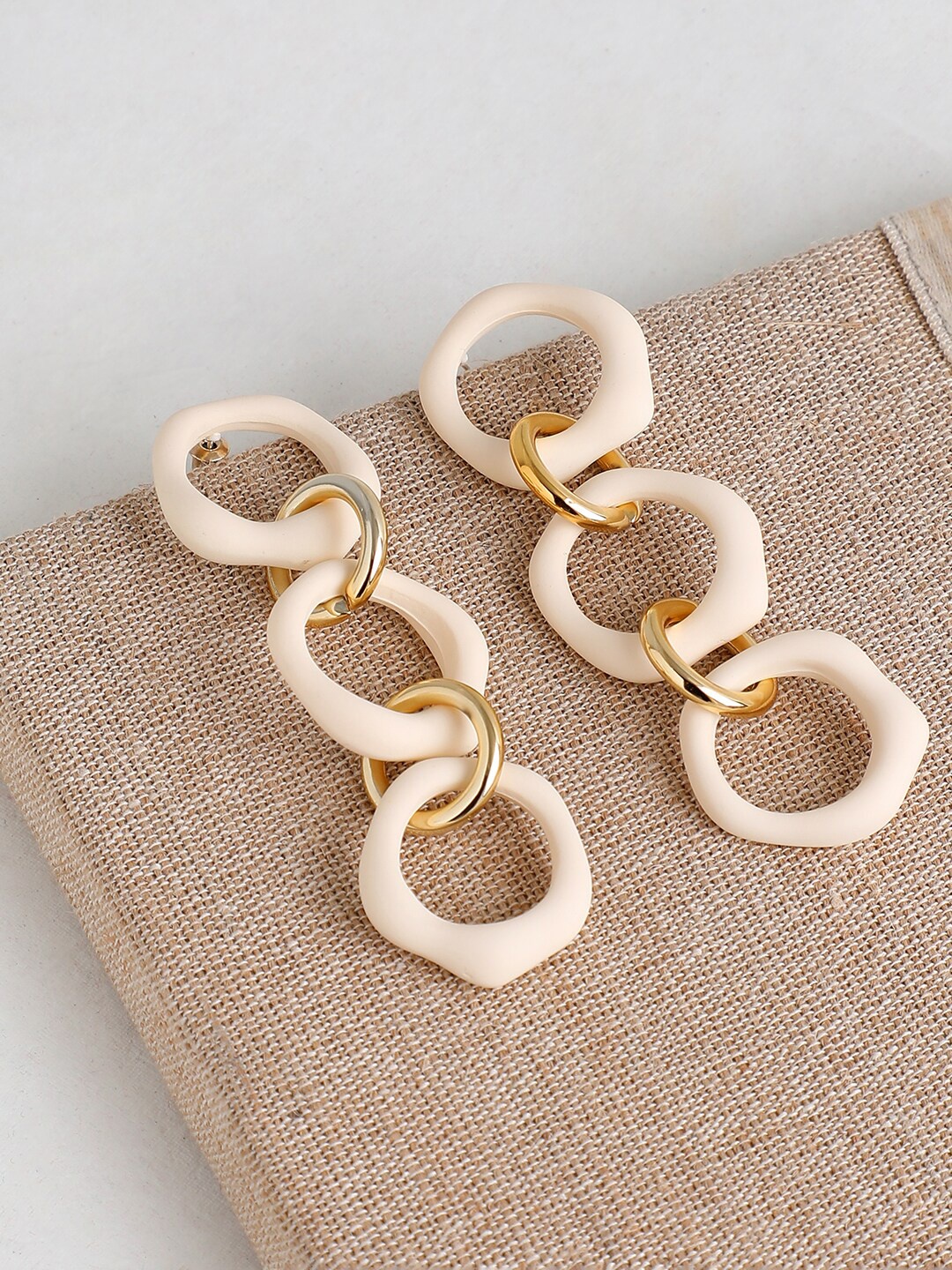 

SOHI White Contemporary Drop Earrings