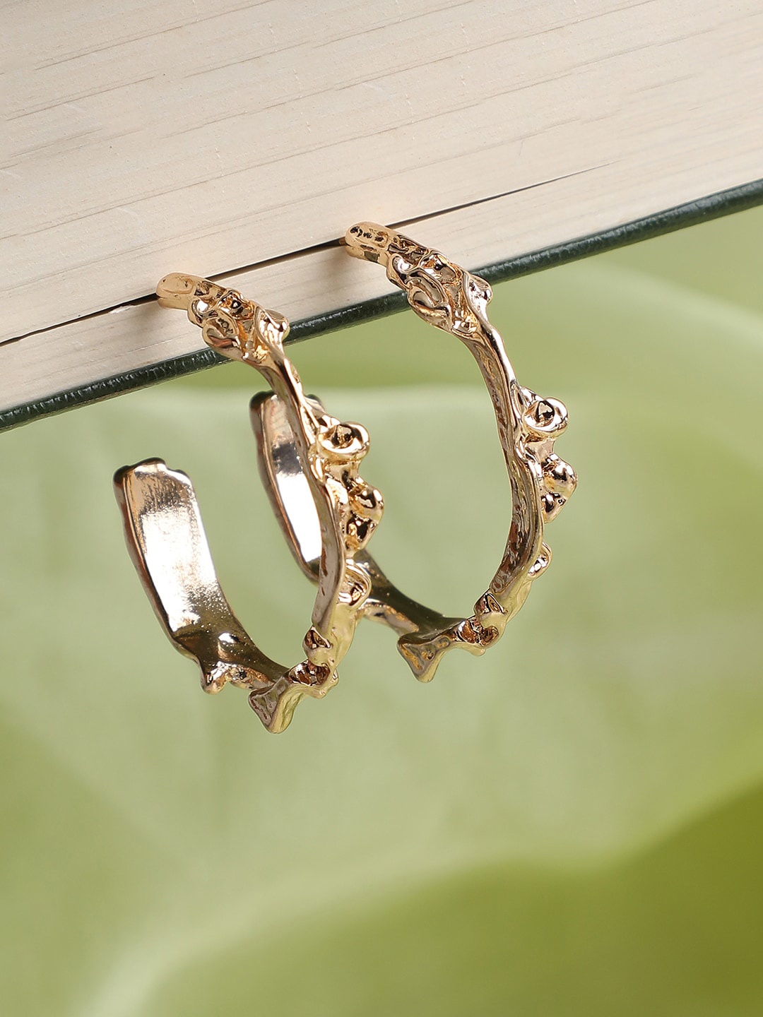

SOHI Gold-Toned Contemporary Drop Earrings