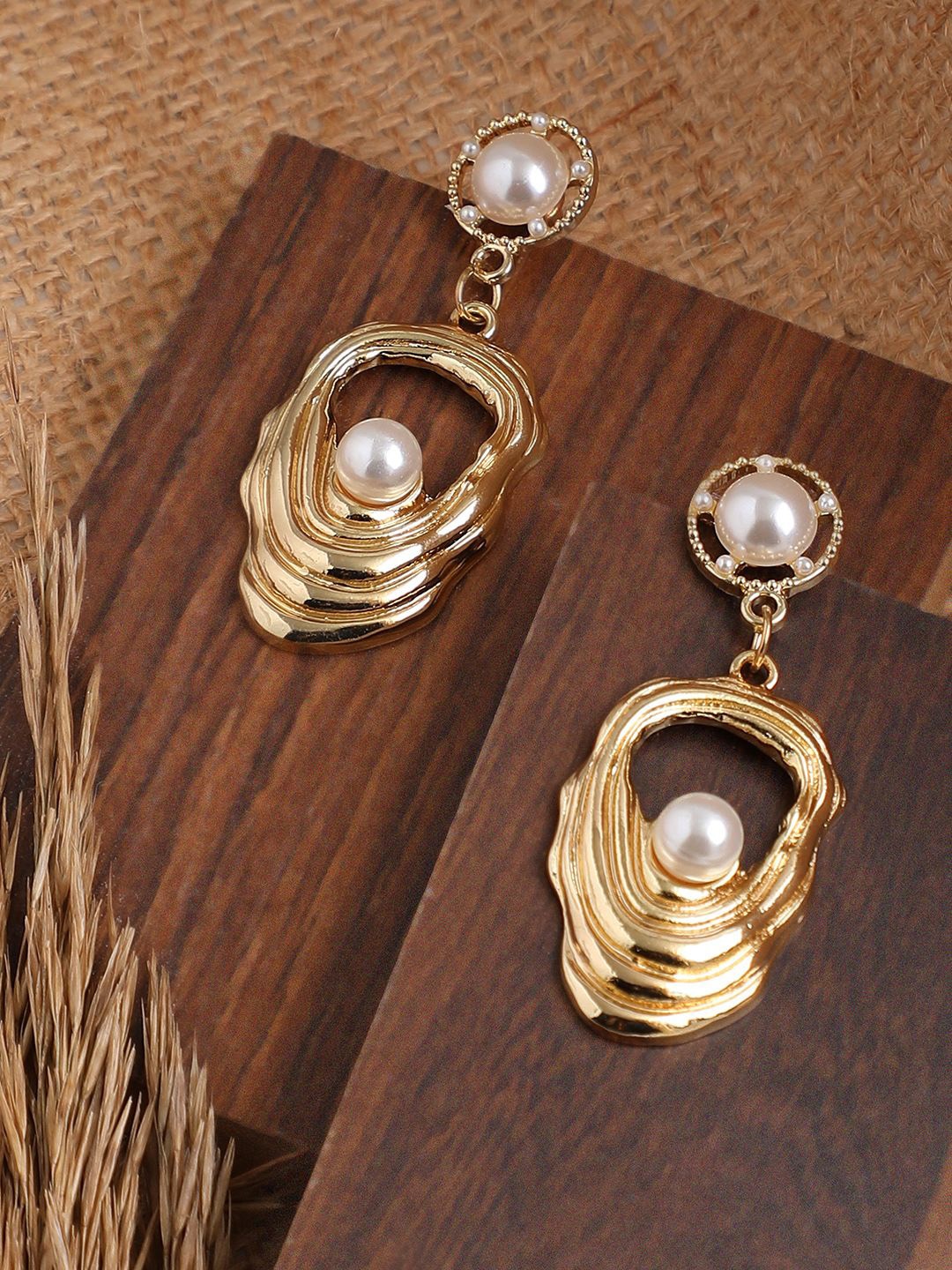 

SOHI Gold-Toned & White Gold Plated Contemporary Drop Earrings