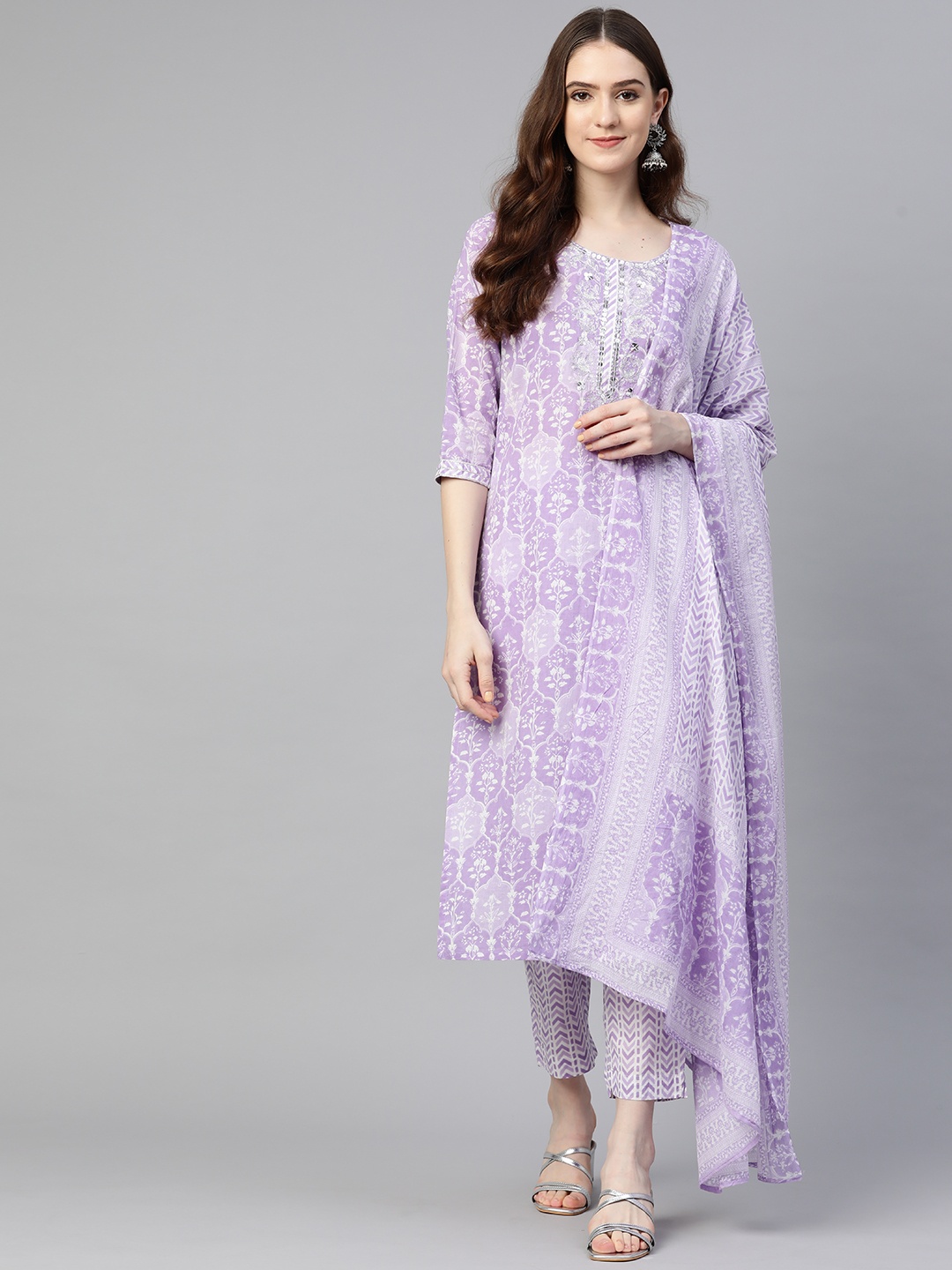 

Readiprint Fashions Women Purple Embroidered Kurta with Trousers & With Dupatta