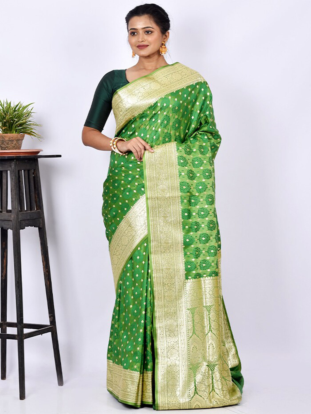 

AllSilks Green & Gold-Toned Ethnic Motif Zari Satin Banarasi Saree
