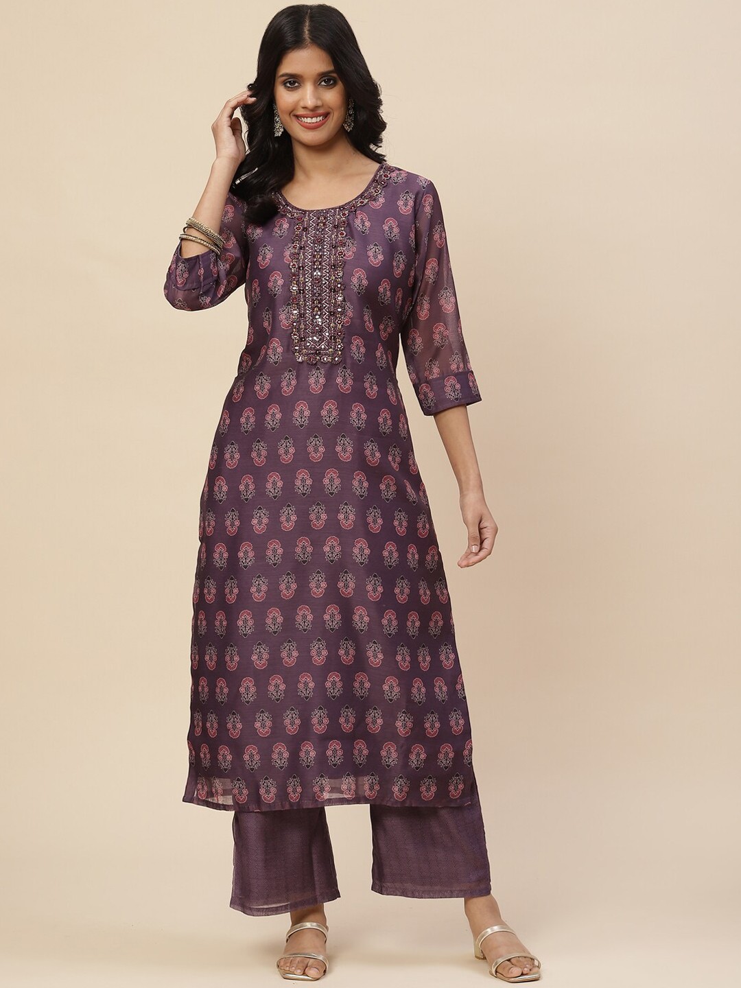 

Meena Bazaar Women Purple Floral Printed Thread Work Kurta with Trousers