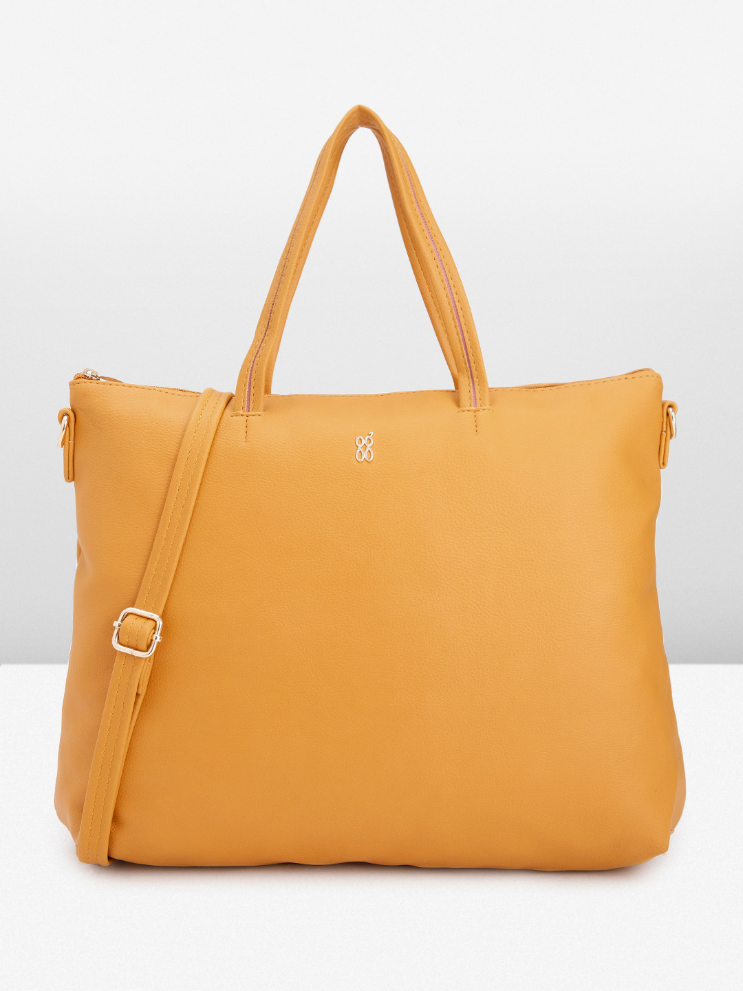 

Baggit Women Solid Handheld Bag, Yellow