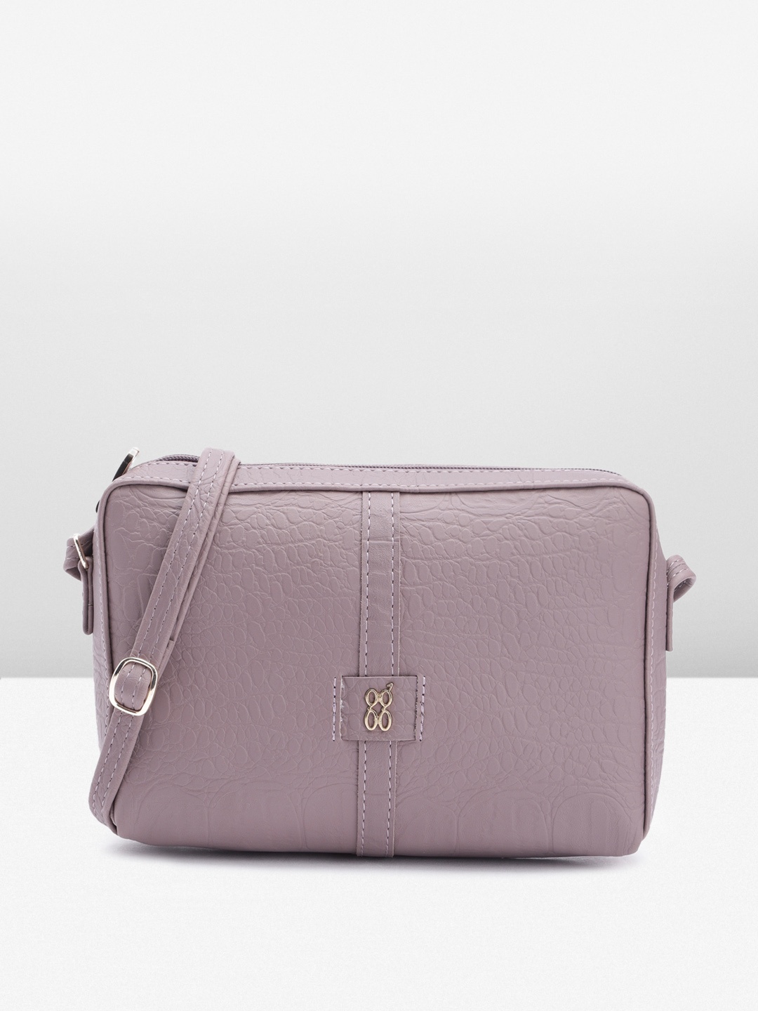 

Baggit Animal Textured Structured Sling Bag, Mauve