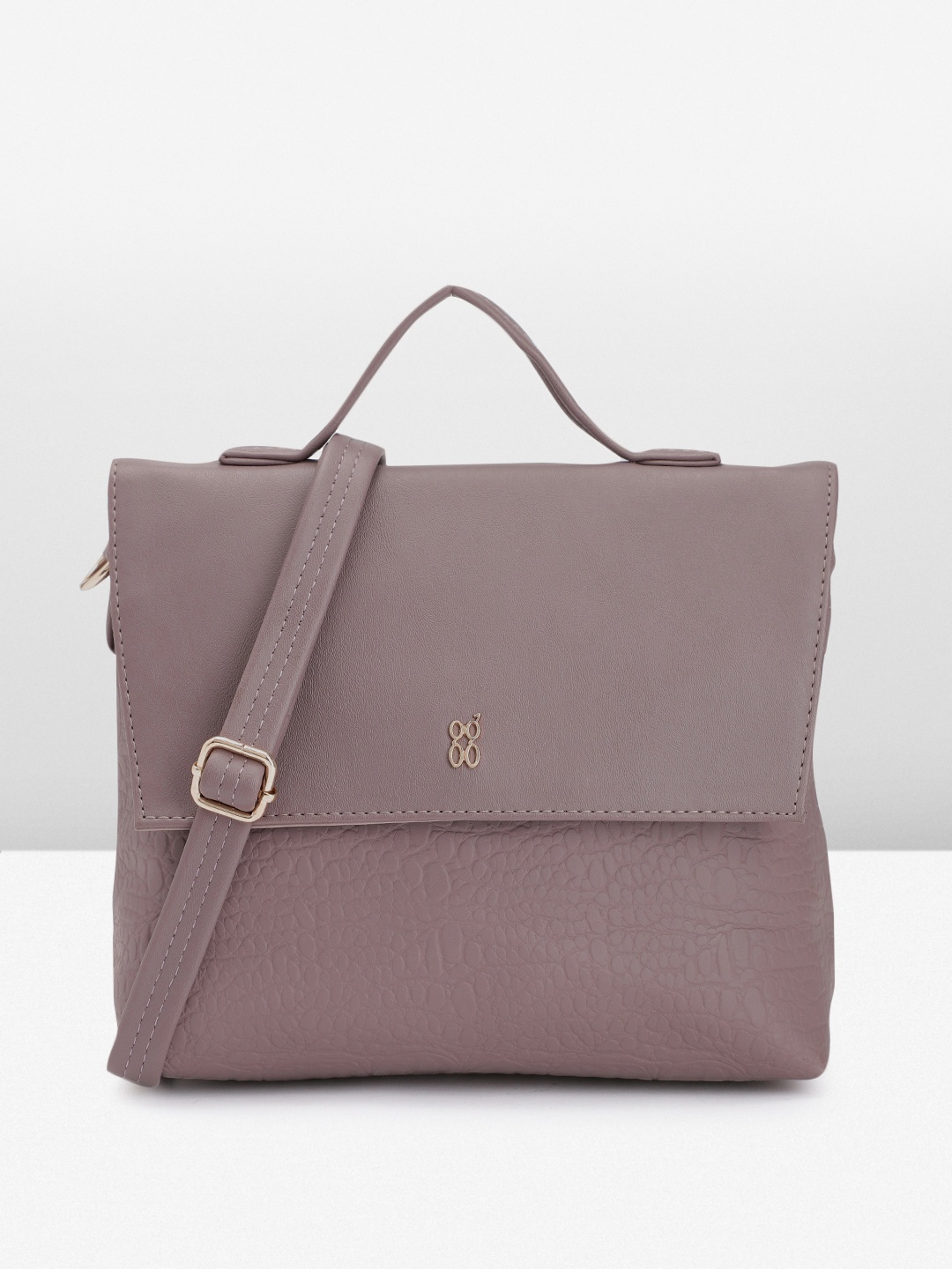 

Baggit Dinosaur Textured PU Regular Structured Satchel, Mauve