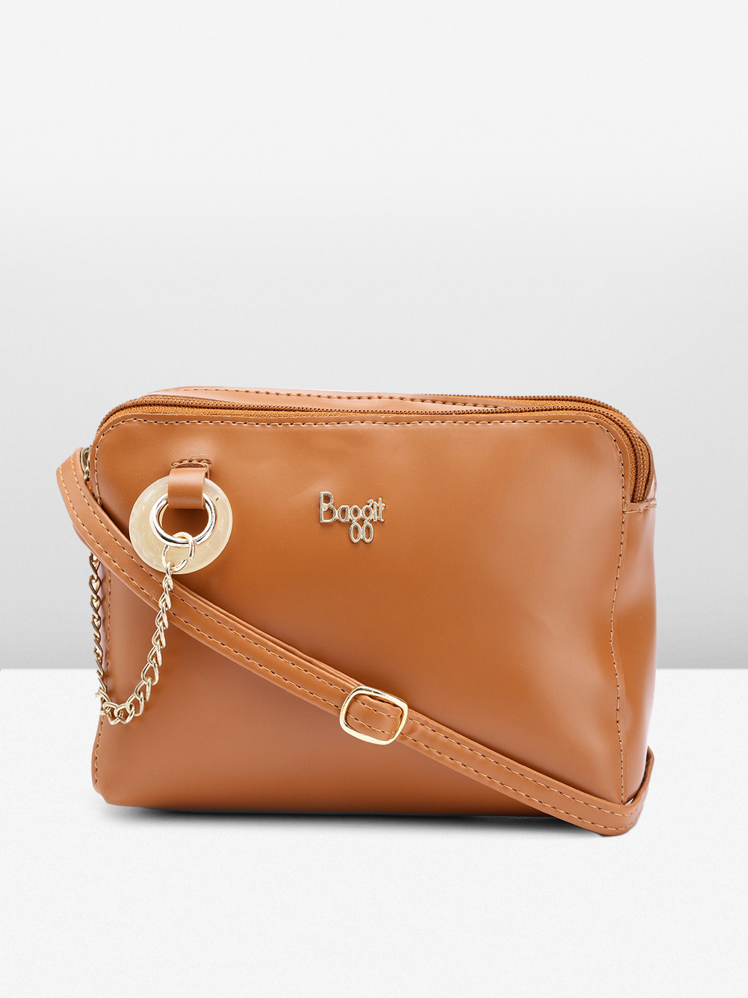 

Baggit Women Solid Sling Bag, Tan