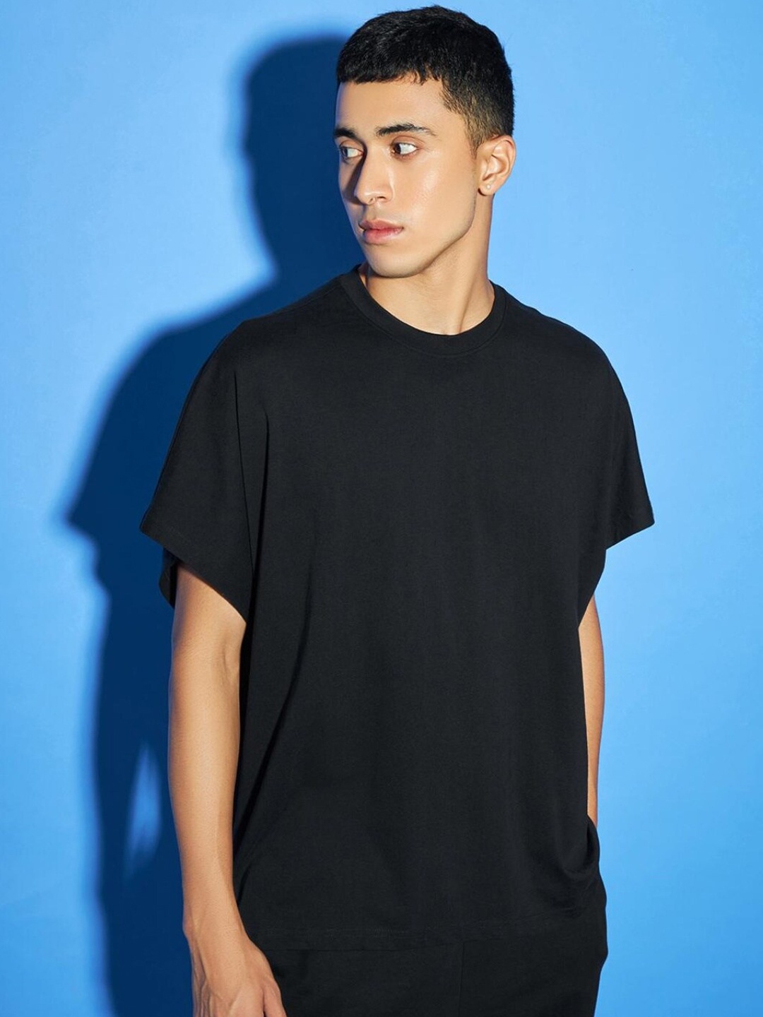 

Bewakoof Men Black Solid Round Neck T-shirt