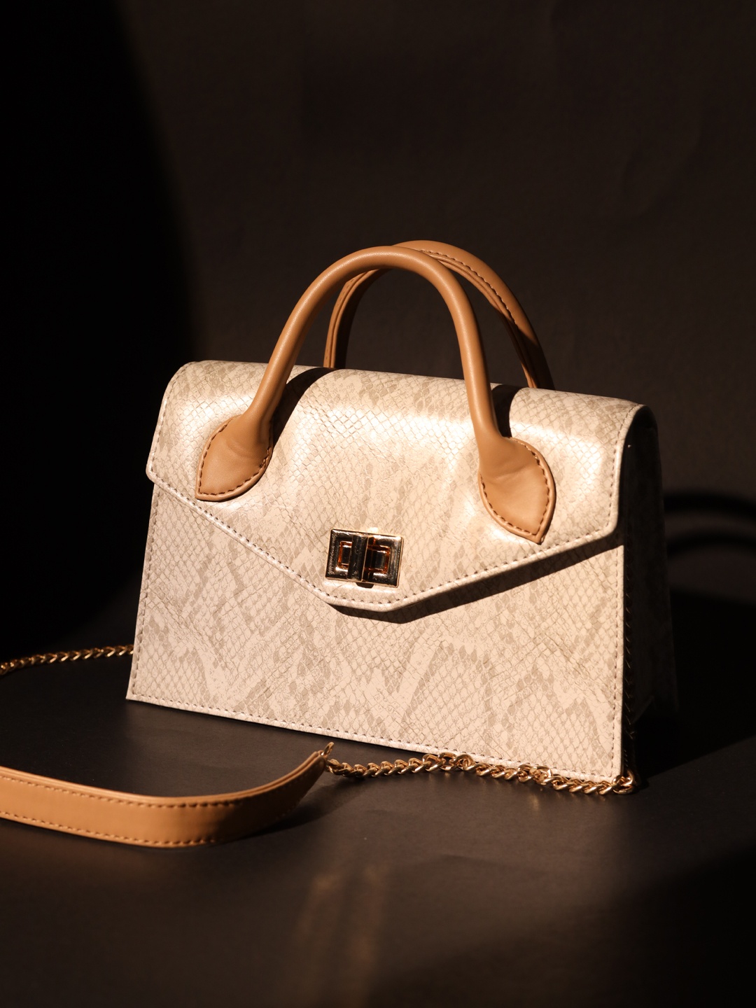 

FERROCCIO Beige Animal Printed Structured Handheld Bag with Tasselled