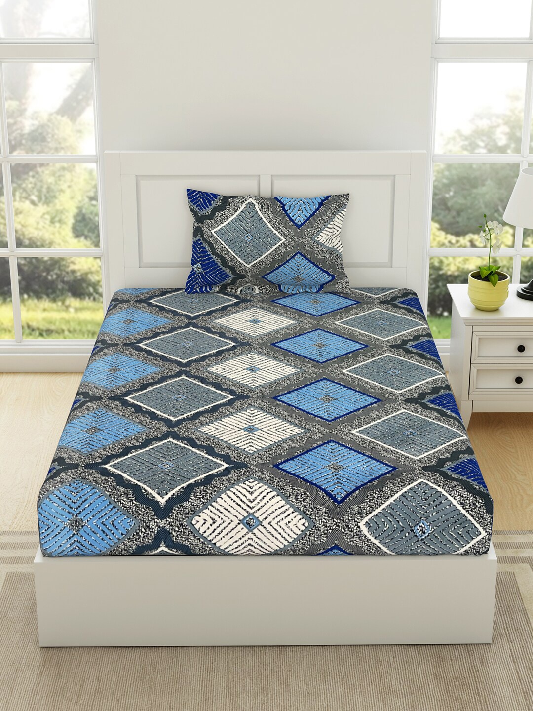 

Welspun Assorted Geometric 144 TC Flow Cotton Single Bedsheet with 1 Pillow Covers