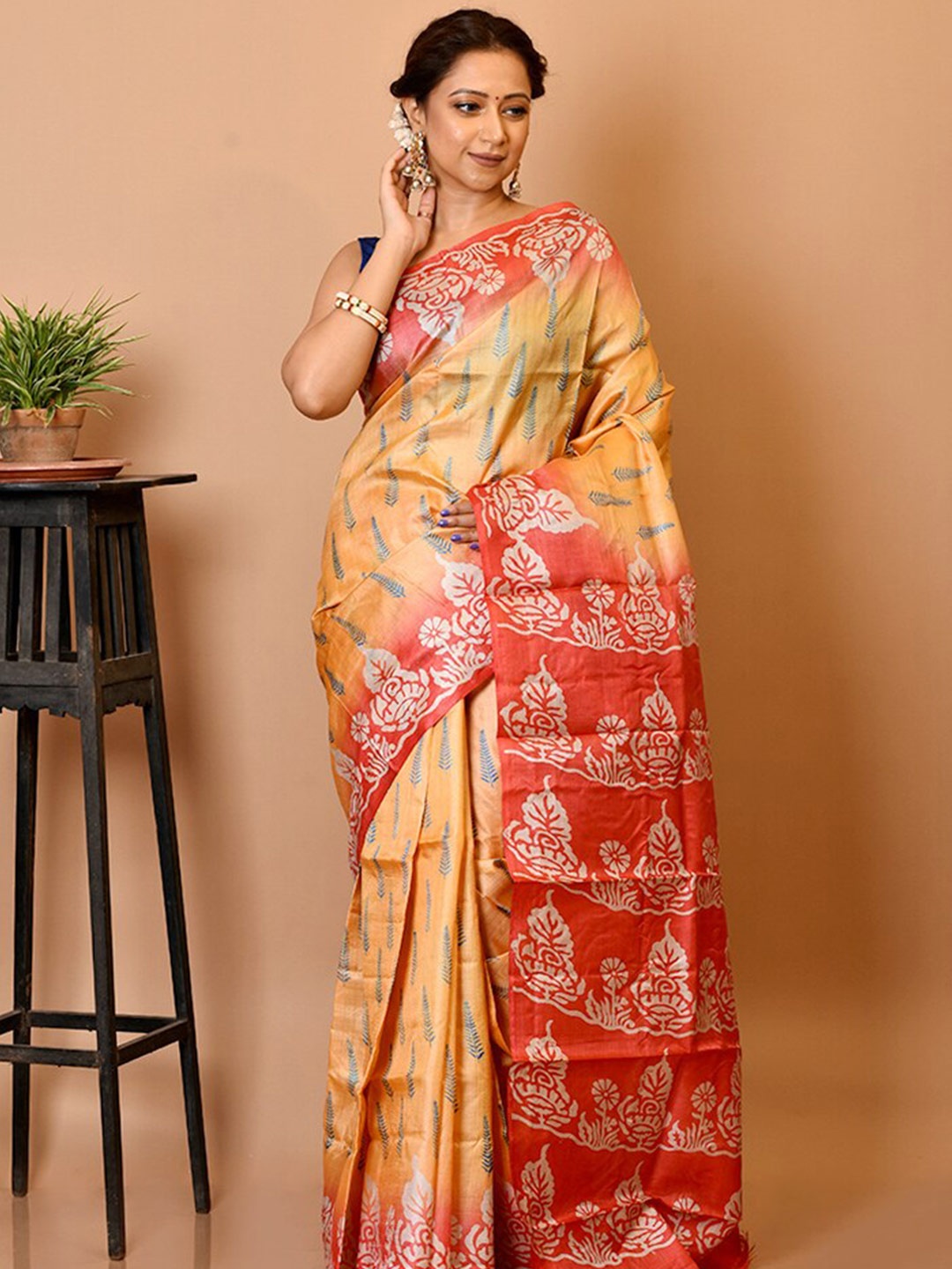 

AllSilks Peach-Coloured & Yellow Floral Silk Blend Tussar Saree