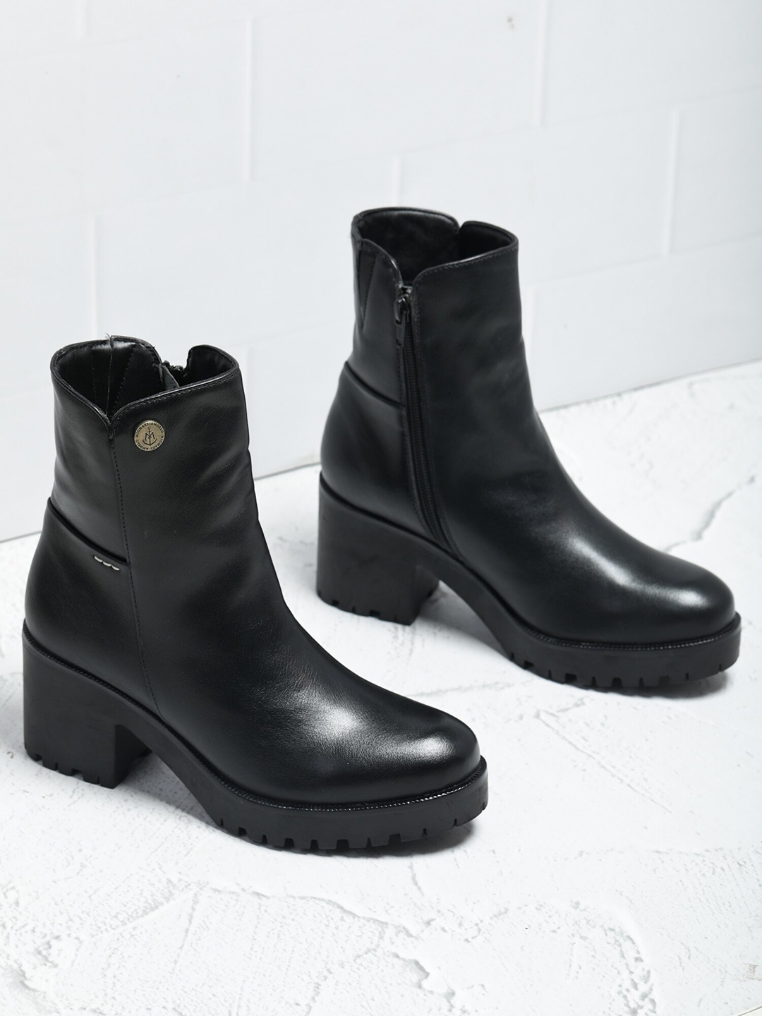 

MICHAEL ANGELO Women Black Solid Chelsea Heeled Boots