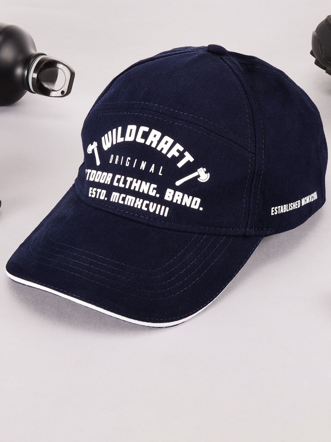 

Wildcraft Adults Navy Blue & White Typography Printed Cotton Baseball Cap