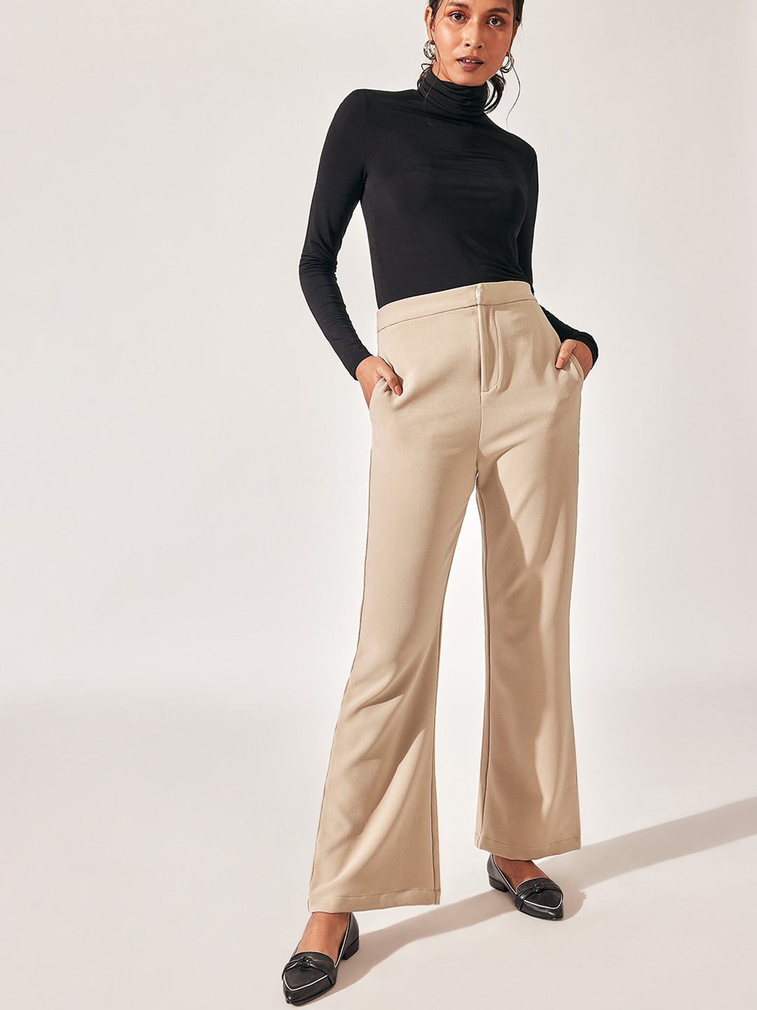 

The Label Life Women Beige Solid Flared High-Rise Trousers