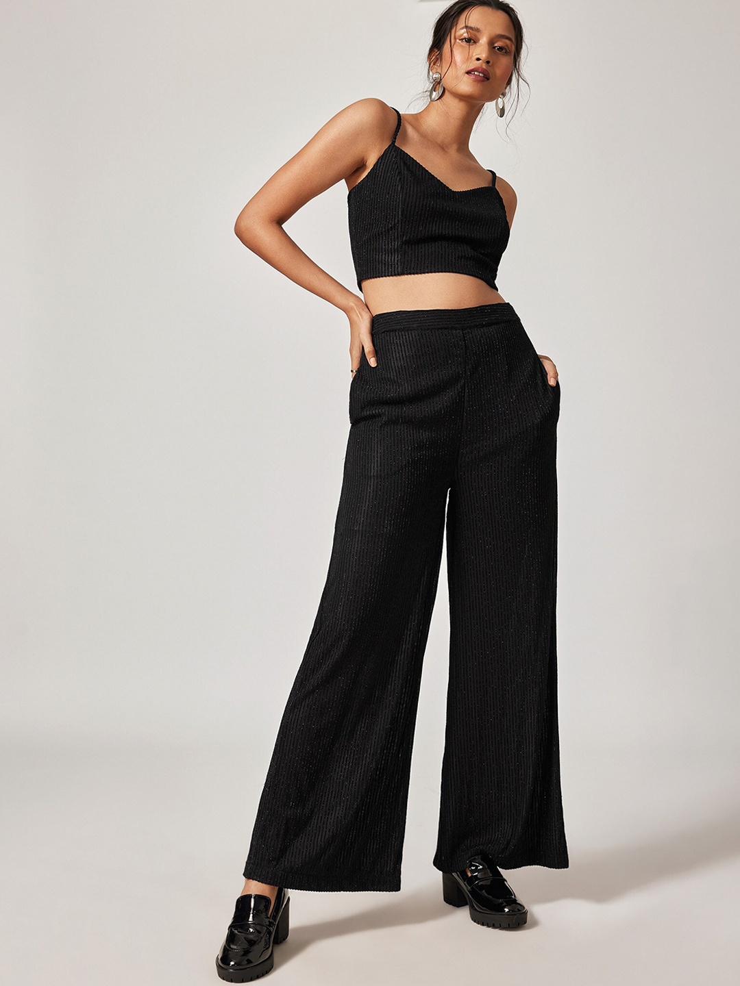 

The Label Life Women Black Solid Flared High-Rise Trousers