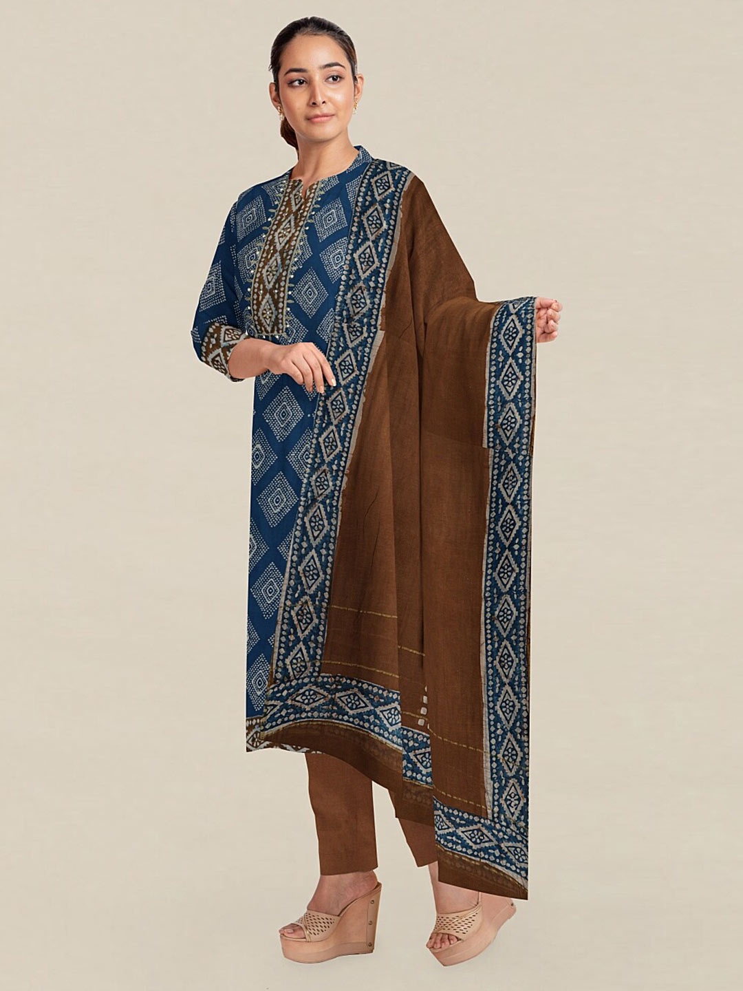 

Pothys Blue & Brown Printed Unstitched Dress Material