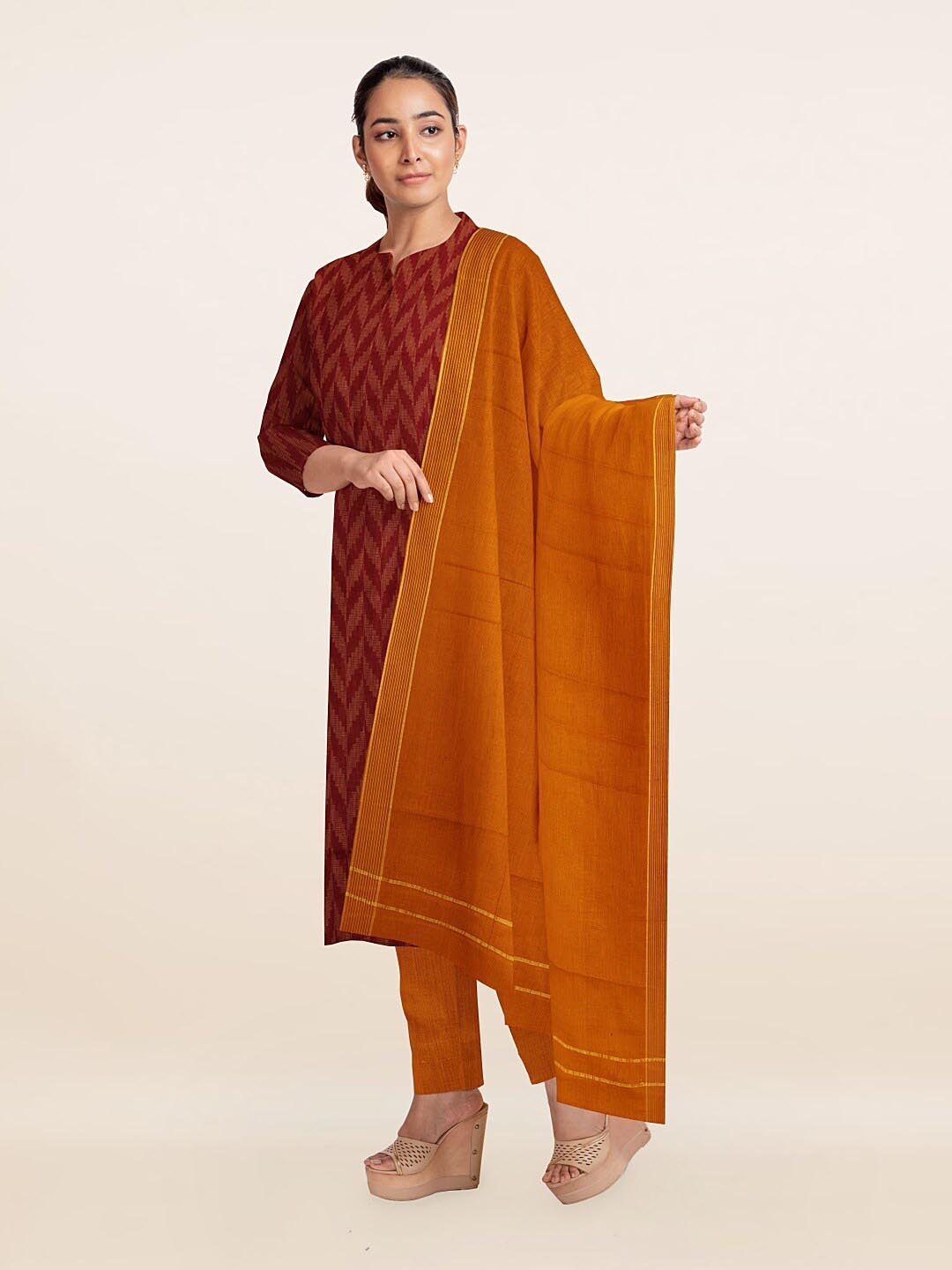 

Pothys Maroon & Mustard Printed Unstitched Dress Material