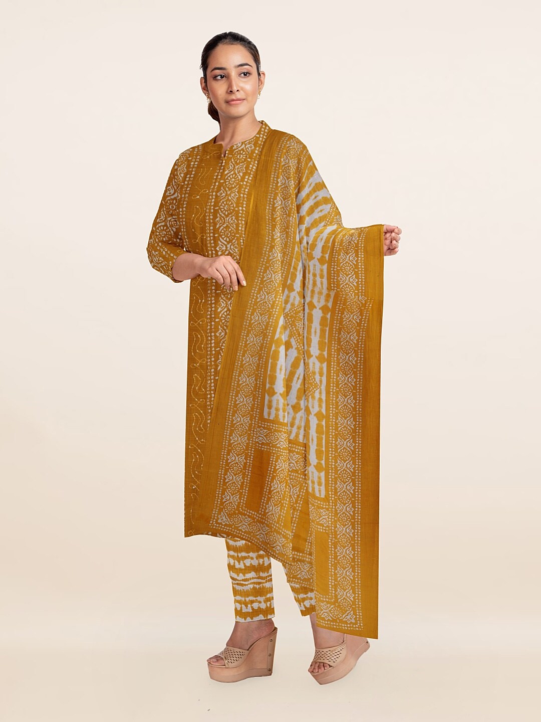 

Pothys Mustard & White Printed Unstitched Dress Material